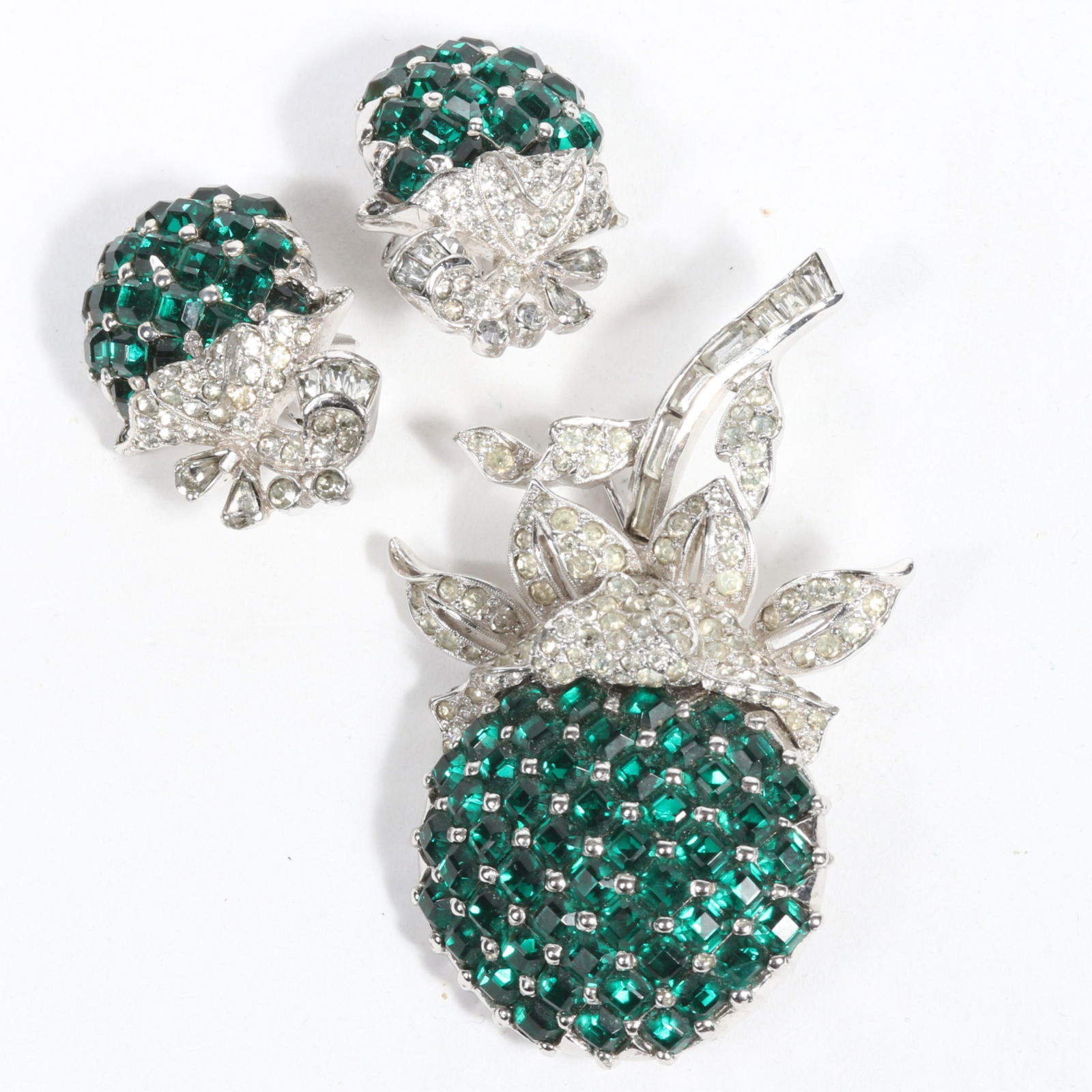 Vintage Retro / Art Deco Mazer Bros emerald green jeweled fruit brooch and matching earrings with: Vintage Retro / Art Deco Mazer Bros emerald green jeweled fruit brooch and matching earrings with clear rhinestone crystals. Provenance: From the collection of Cheryl Killmer. 2 5/8"H x 1 7/8"W (brooc