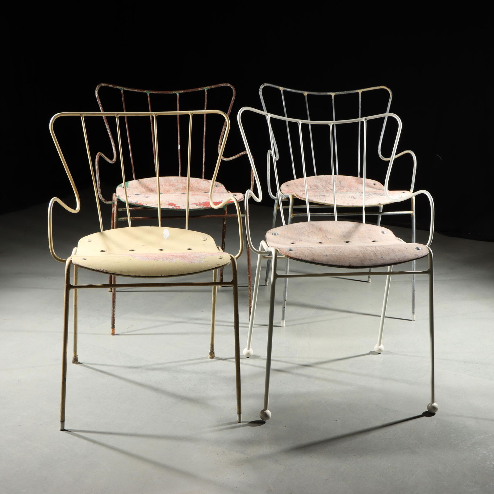 Set of 4 Ernest Race Antelope MCM hairpin armchairs 31 1/4"H 20 3/4"W (one): Set of 4 Ernest Race Antelope MCM hairpin armchairs designed in 1951, the black metal frames around molded plywood seats. Unsigned. Paint is not original. Only one with four ball feet. One seat needs