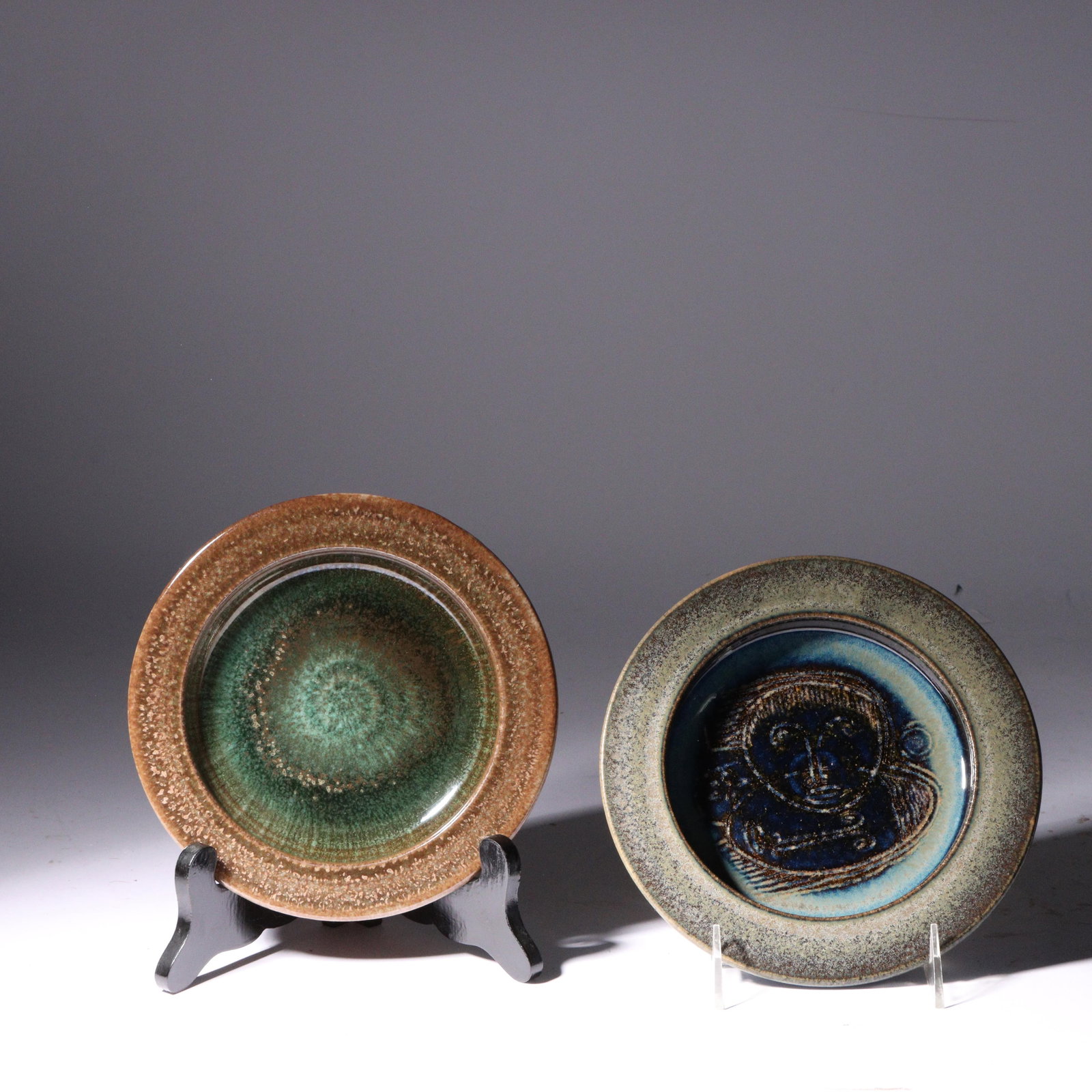 Pair of Edwin and Mary Scheier glazed art pottery low bowls, one with incised face 1"H x 7 1/2"Diam.: Pair of Edwin and Mary Scheier glazed art pottery low bowls, one with incised face Incised signature under base. Biography from Leland Little Auctions: Mary and Edwin Scheier were a married couple who