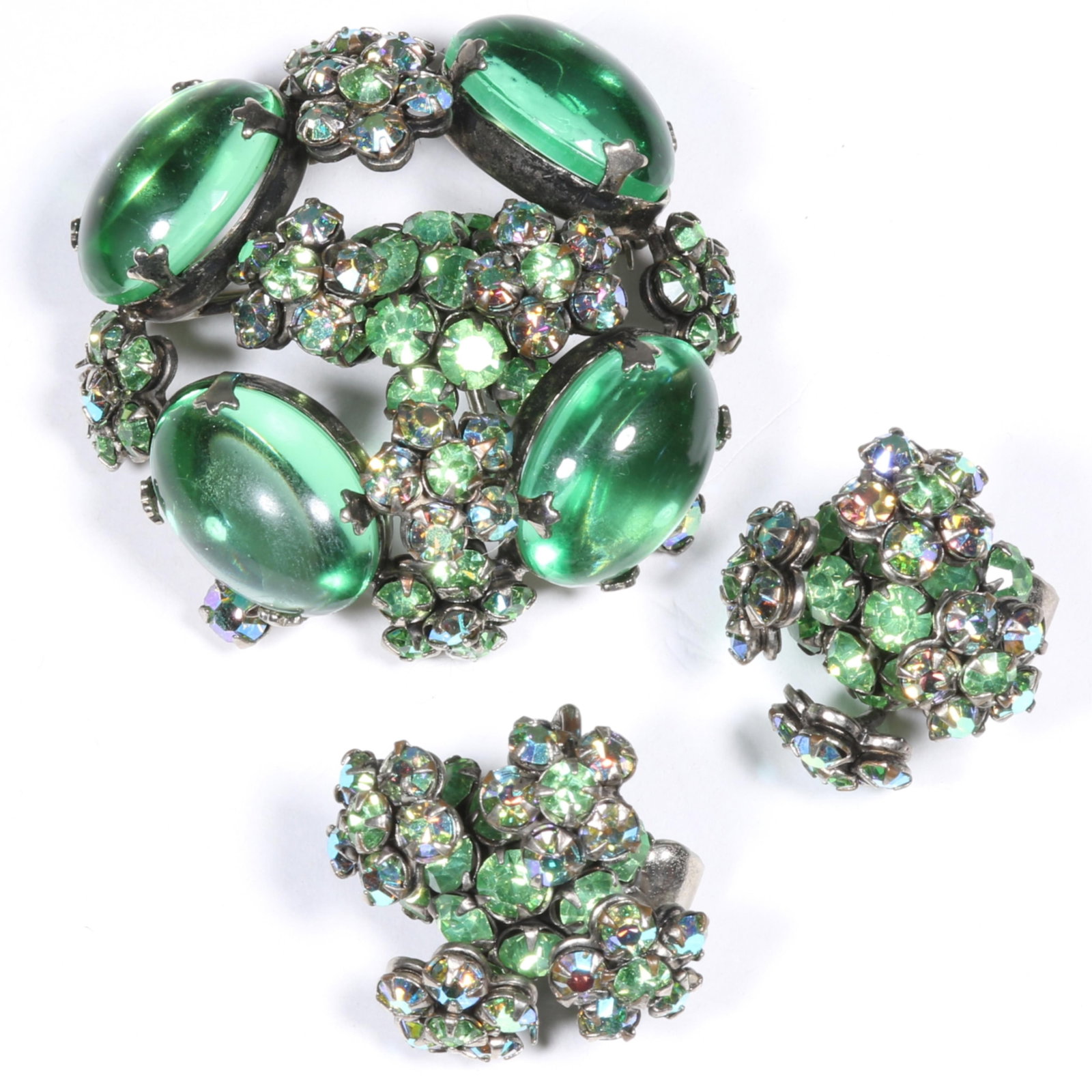Unsigned Schreiner green jelly cabochon dimensional domed pin brooch and matching green rhinestone: Unsigned Schreiner green jelly cabochon dimensional domed pin brooch and matching green rhinestone crystal earrings. 1 7/8"Diameter (brooch)
