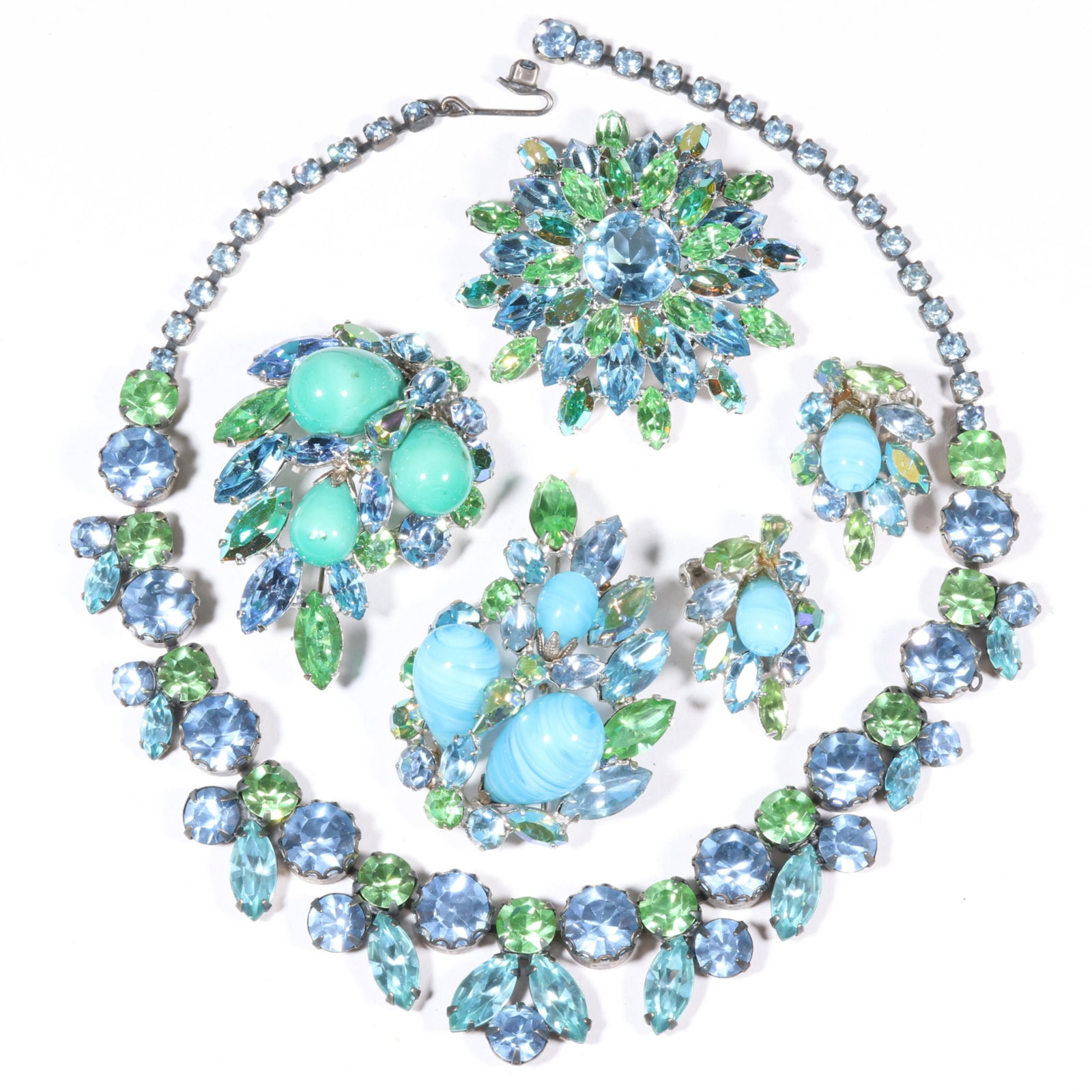 Vintage Regency blue and green crystal with blue candy swirl art glass group of necklace, art glass: Vintage Regency blue and green crystal with blue candy swirl art glass group of necklace, art glass brooch with matching earrings, teal art glass brooch, and floral brooch. 15 1/2"L x 1"W (necklace)