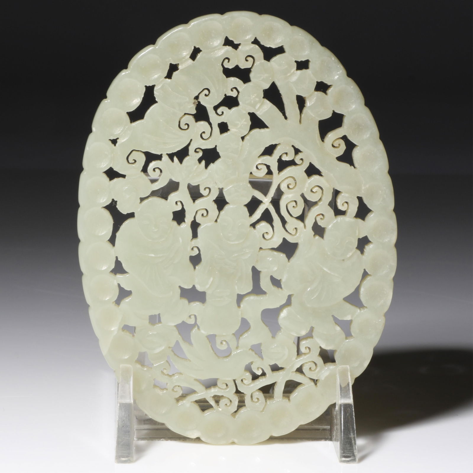 Chinese carved white jade oval plaque ornament with reticulated scrolling floral garden motif. 3: Chinese carved white jade oval plaque ornament with reticulated scrolling floral garden motif. 3 3/4"H x 2 3/4"W