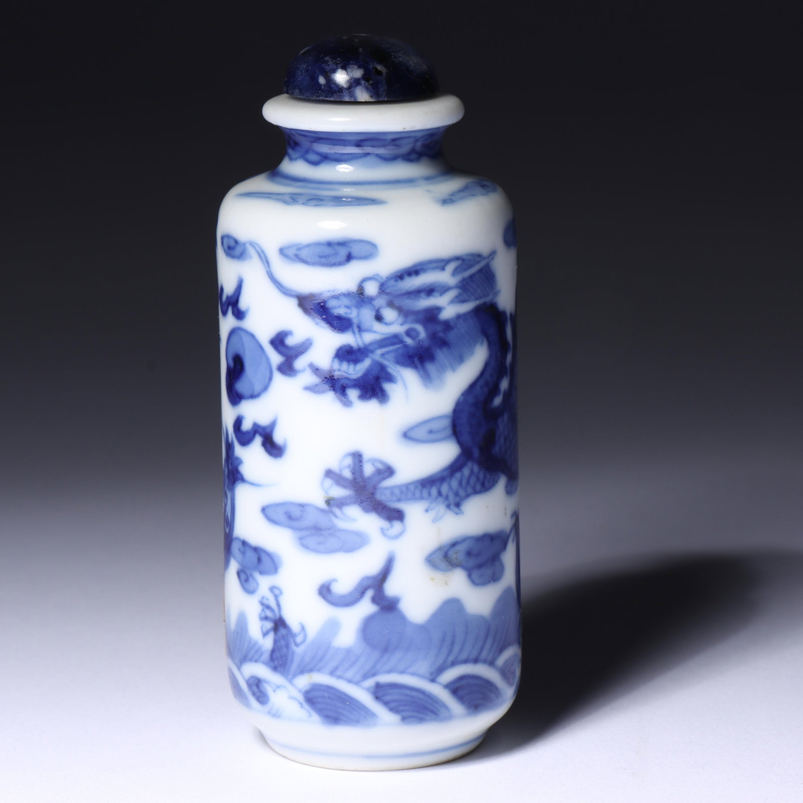 Chinese Yongzheng Qing Dynasty blue underglaze and white porcelain snuff bottle with dragon motif, (1 of 9)