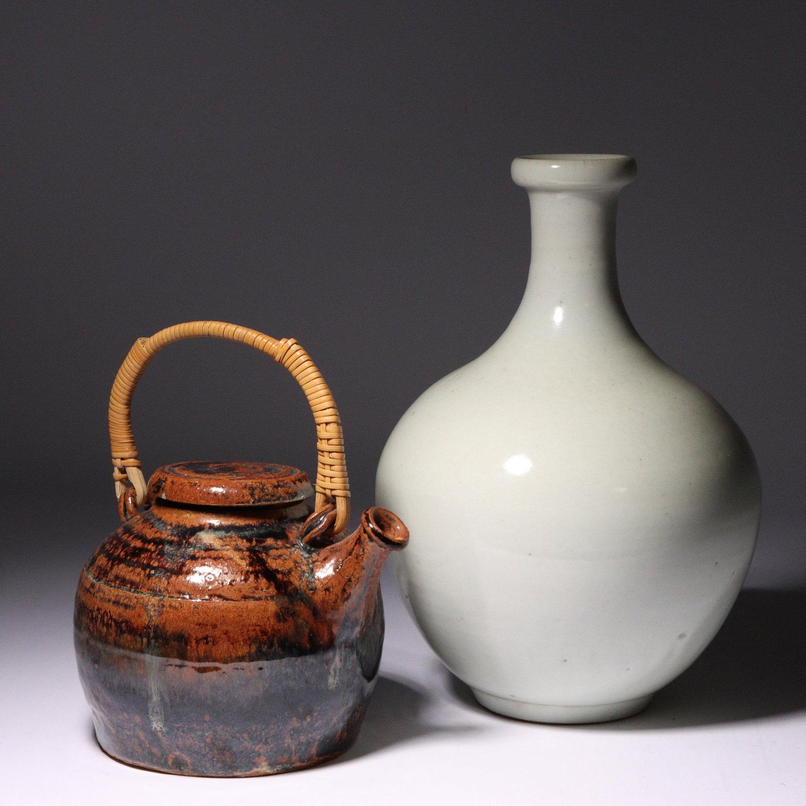 Tenmoku teapot with bamboo wrapped handle and Korean white glaze porcelain bottle vase. 10"H x (1 of 6)