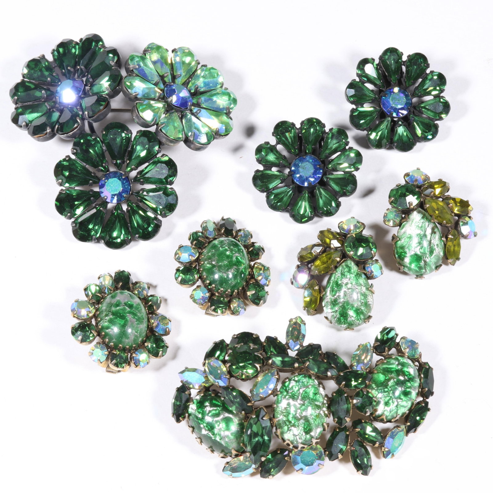 Vintage Regency signed and unsigned green rhinestone crystal and art glass jewelry group. 2 1/2"H x (1 of 10)