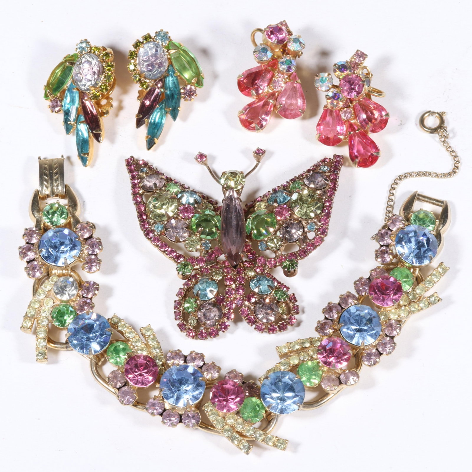 DeLizza & Elster Juliana spring color rhinestone crystal jewelry group. 7 1/4"L x 3/4"W (bracelet): DeLizza & Elster Juliana spring color rhinestone crystal jewelry group. Provenance: From the collection of Cheryl Killmer. 7 1/4"L x 3/4"W (bracelet)