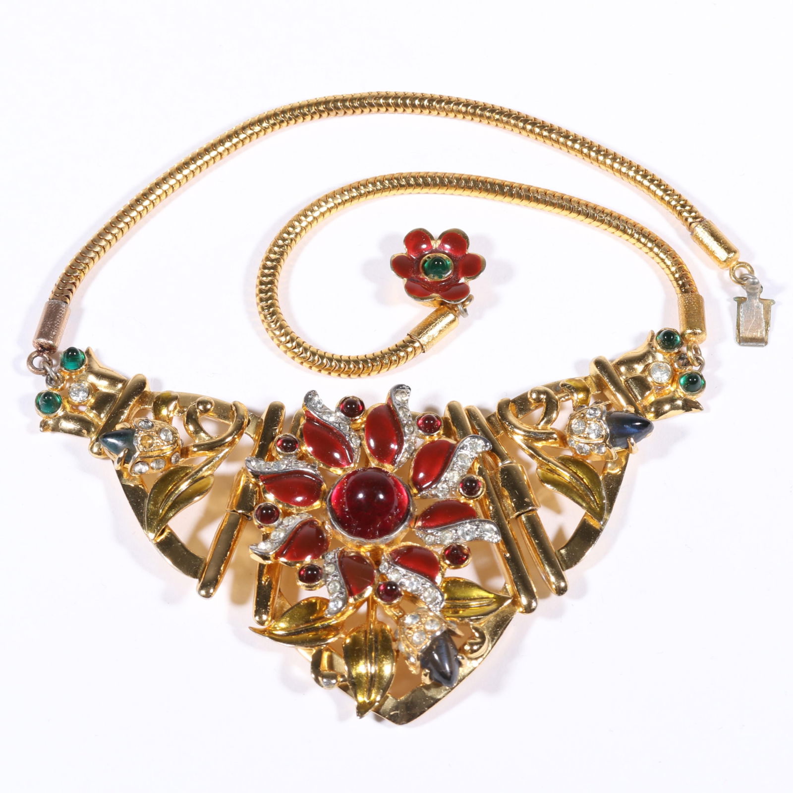 Unsigned Coro Carmen Miranda Retro necklace with enamel flower, jewel toned cabochons and rhinestone: Unsigned Coro Carmen Miranda Retro necklace with enamel flower, jewel toned cabochons and rhinestone crystals. One missing rhinestone on necklace and some missing on bracelet. Provenance: From the col