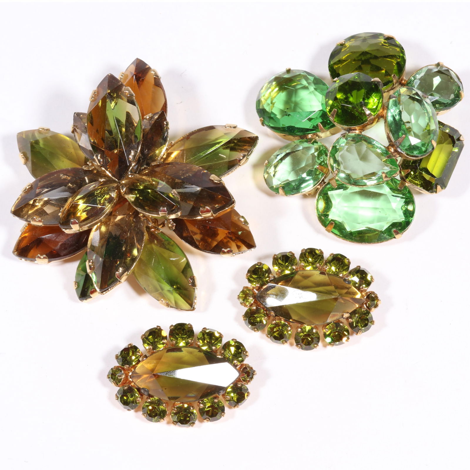 Austrian large dimensional jeweled brooch with complementary earrings and unsigned dimensional green (1 of 11)