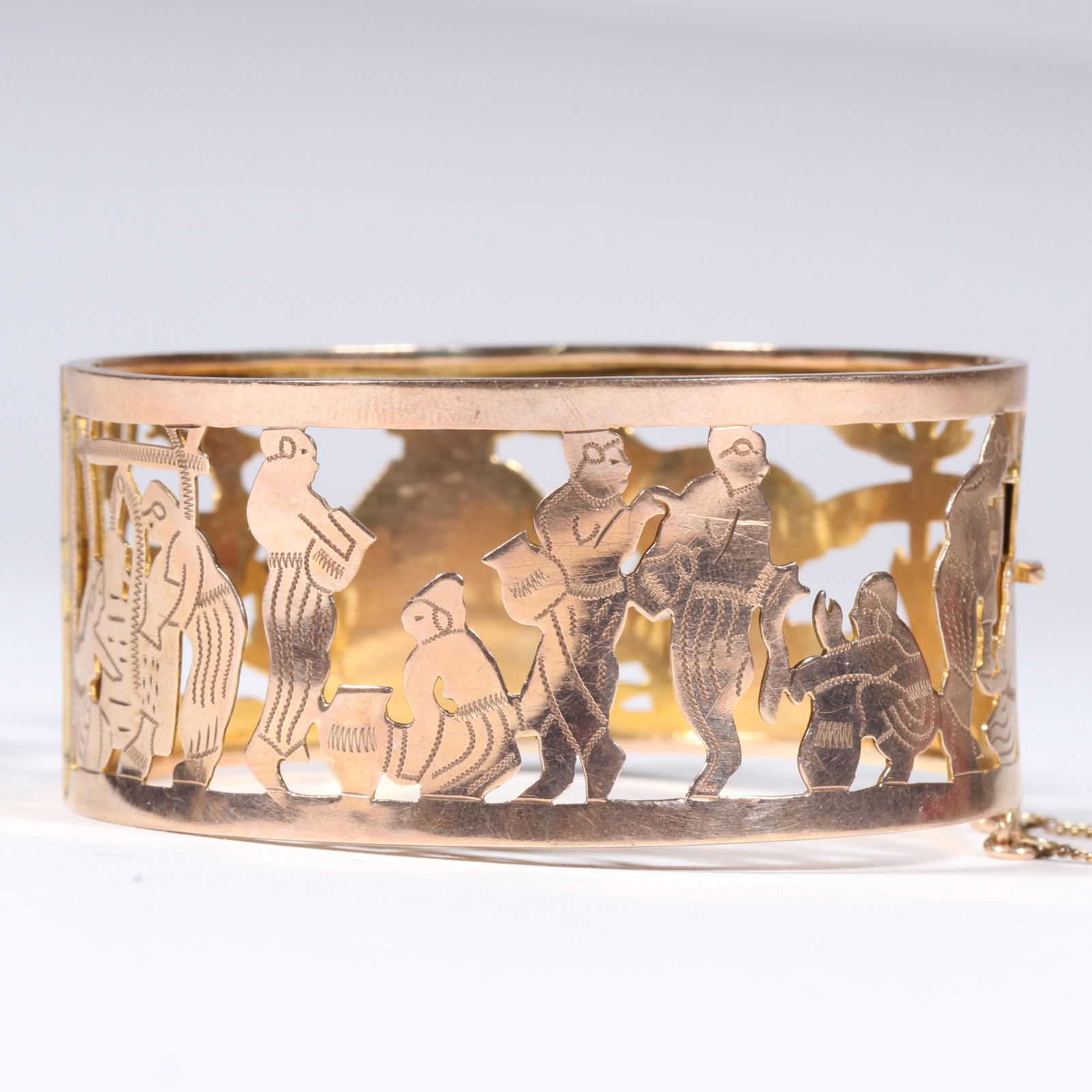 10K yellow gold open work Mexican figural bracelet. 1 1/4"H x 2 1/2"Inner Diameter (1 of 7)