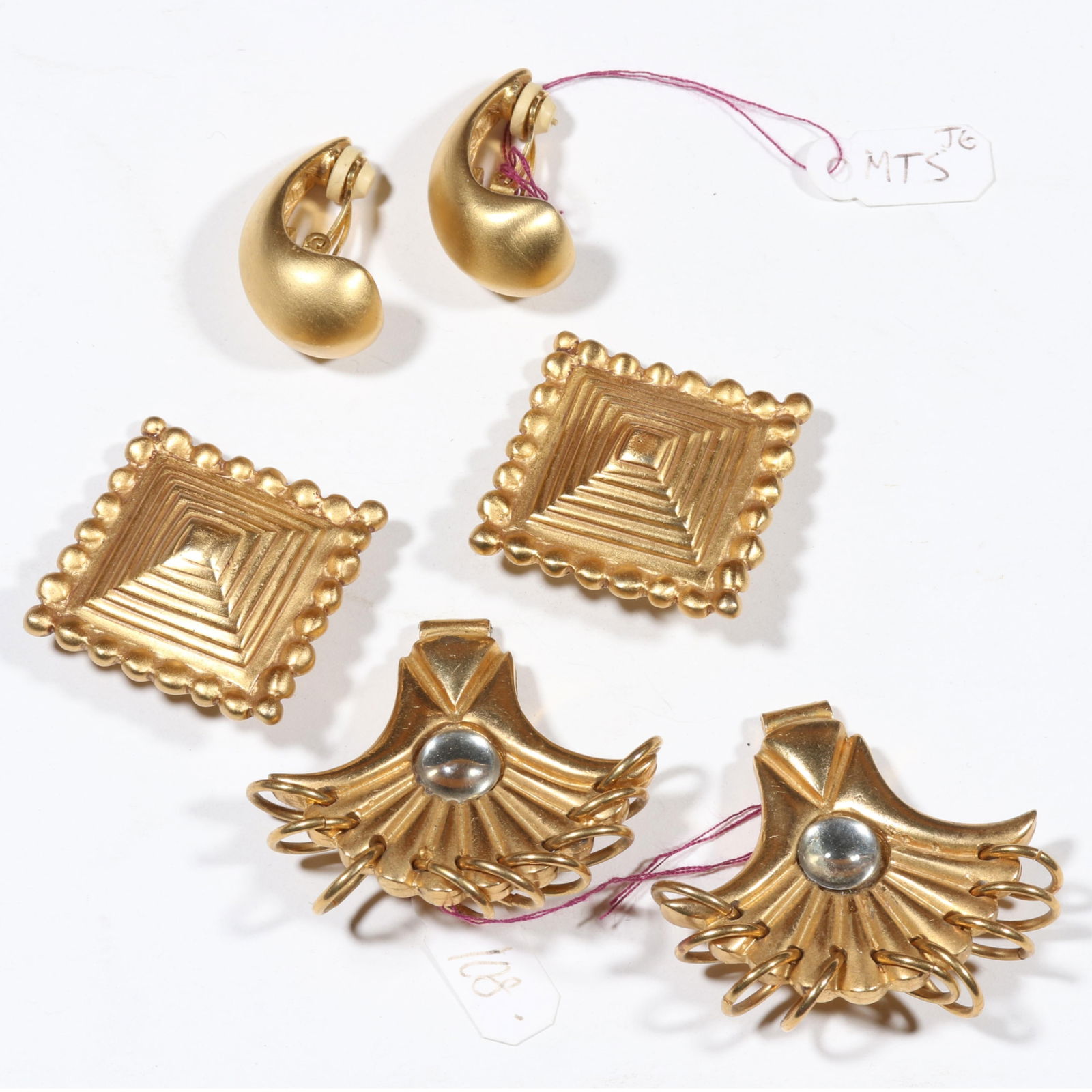 Designer earrings 3pc group with curved bell Givenchy earrings, Valentino square earrings, and: Designer earrings 3pc group with curved bell Givenchy earrings, Valentino square earrings, and designer? unsigned ring dangle earrings. 1 3/4"H x 1 5/8"W (largest earrings)