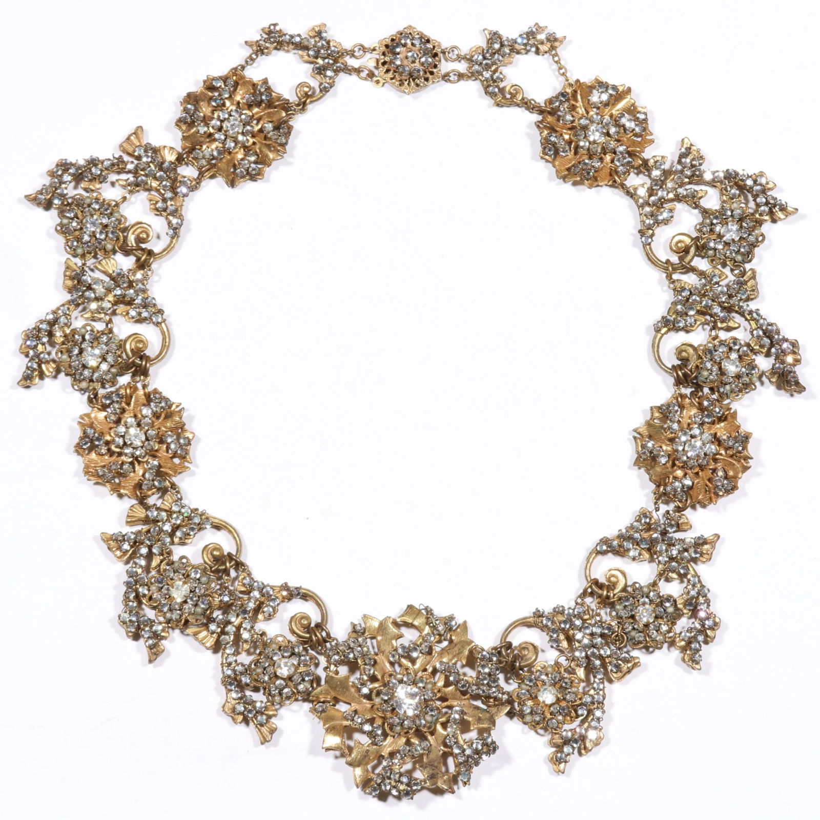 Miriam Haskell floral collar necklace covered in sparkling rhinestone crystals with floral box: Miriam Haskell floral collar necklace covered in sparkling rhinestone crystals with floral box clasp. Missing rhinestone. 15 3/4"H x 1 3/4"W