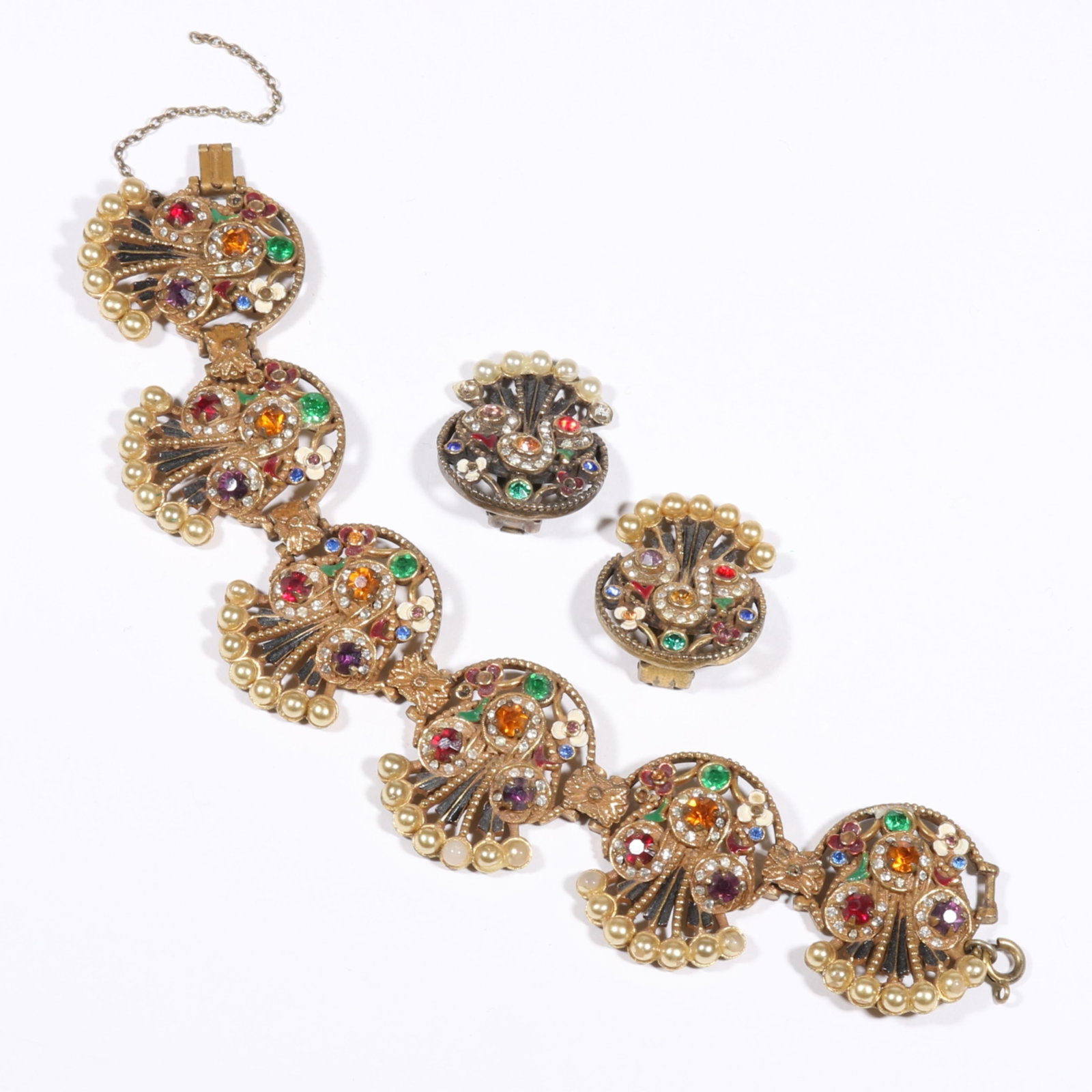 Vintage Austro Hungarian enamel, rhinestone, and faux pearl floral bracelet with matching earrings.: Vintage Austro Hungarian enamel, rhinestone, and faux pearl floral bracelet with matching earrings. Loss of pearl coating, missing rhinestones, and loss of enamel. 7 1/4"L x 1 1/4"W (bracelet)