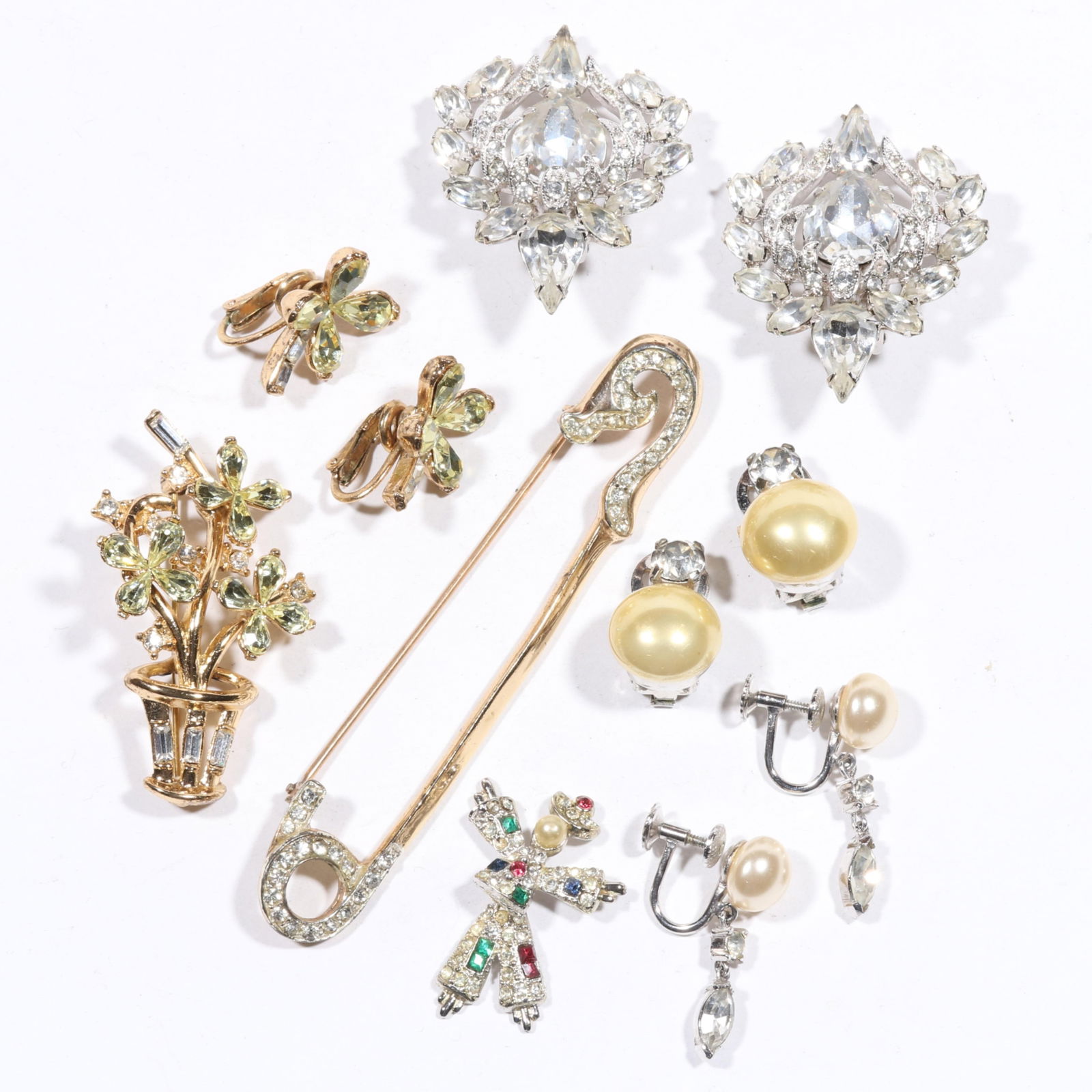 Vintage rhinestone crystal 7pc. jewelry group with Eisenberg rhinestone earrings, unsigned Coro?: Vintage rhinestone crystal 7pc. jewelry group with Eisenberg rhinestone earrings, unsigned Coro? moving dancer pin, Coro safety pin brooch, Trifari flower pot brooch and matching earrings and Trifari