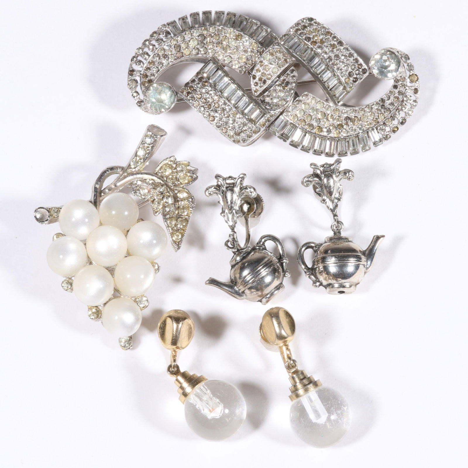 Coro Duette / Coro 4pc. group with rhinestone crystal duette, Lucite grape brooch, teapot earrings,: Coro Duette / Coro 4pc. group with rhinestone crystal duette, Lucite grape brooch, teapot earrings, and Lucite bulb earrings. Duette has some "dead" stones. 1 1/4"H x 2 5/8"W (duette)