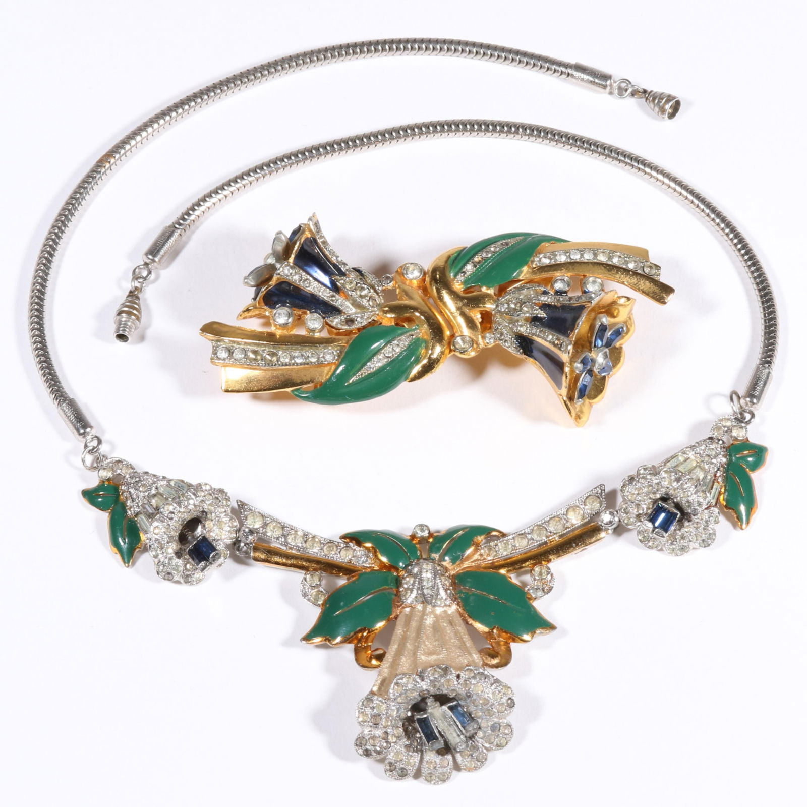 Coro damaged trembler group with blue enamel Coro Duette dress clip brooch and unsigned Coro Bell: Coro damaged trembler group with blue enamel Coro Duette dress clip brooch and unsigned Coro Bell Flower trembler necklace. Necklace is missing all of the blue baguette rhinestones on the center flowe