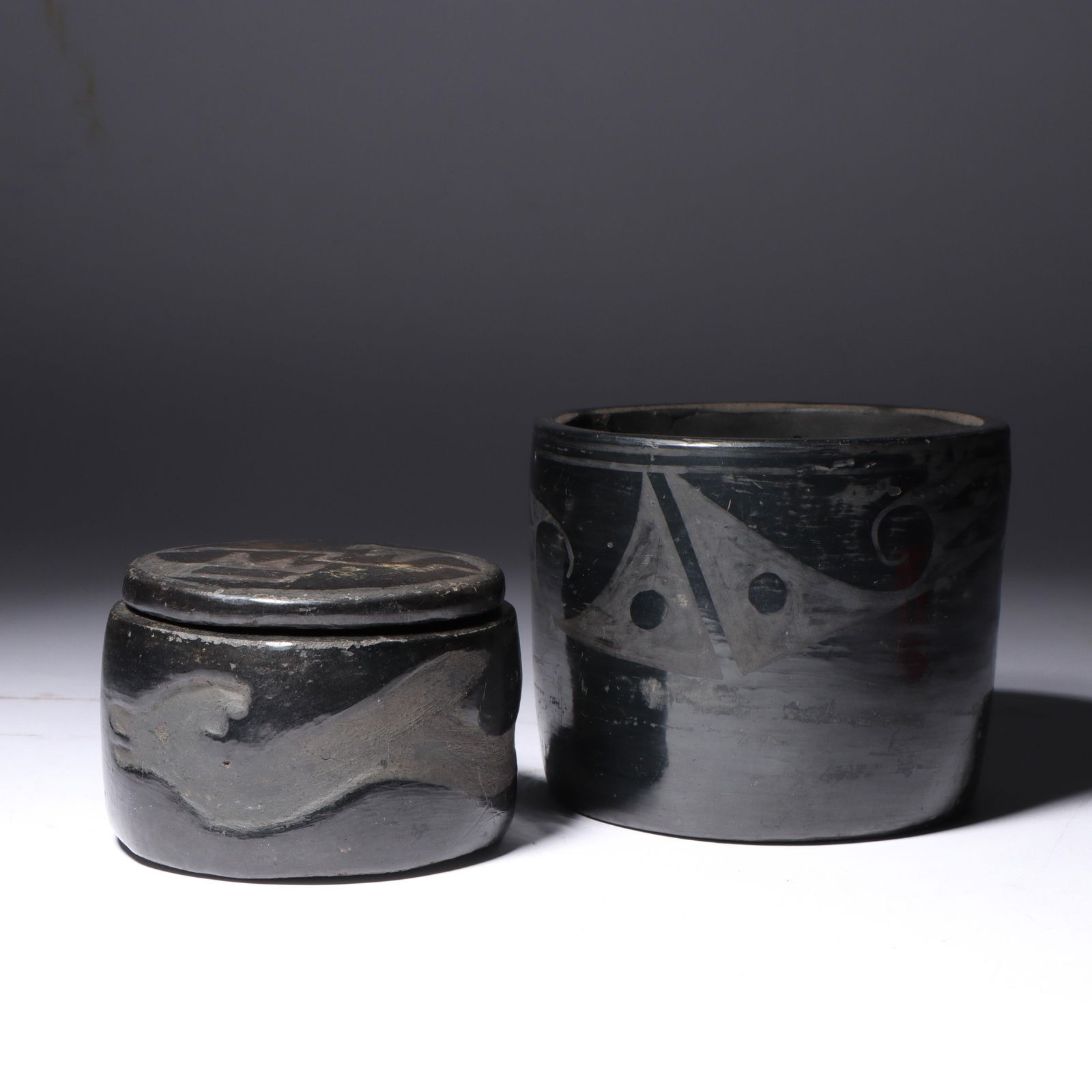 Pair of Native American Southwestern blackware pottery lidded and unlidded vessels 3 1/4"H x 4"diam. (1 of 3)