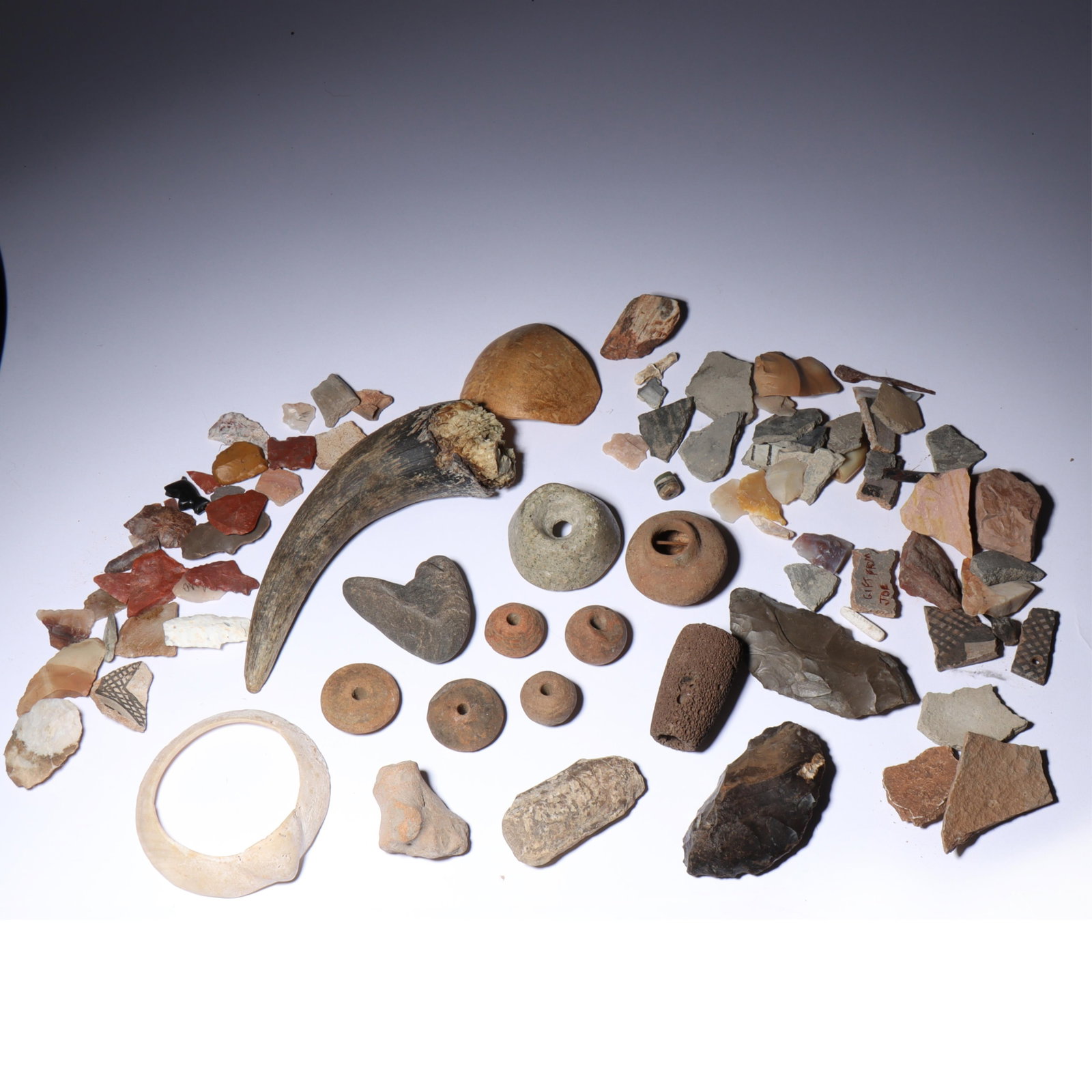 Collection of Native American and natural artifacts, pottery shards, preform points and flint (1 of 8)