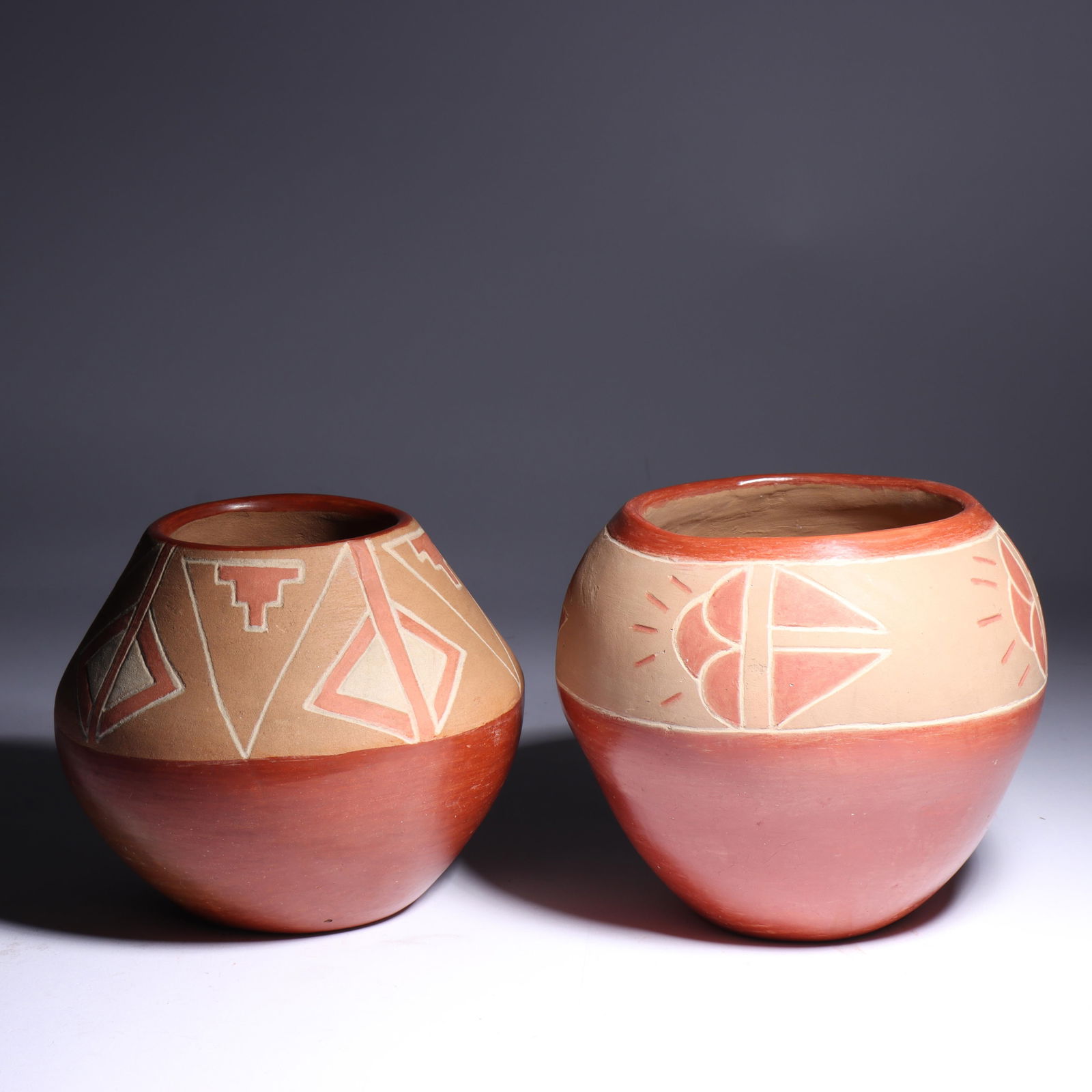 Pair of San Juan Native American polychrome pottery vessels. 5 1/2"H x 6"W (largest) (1 of 7)