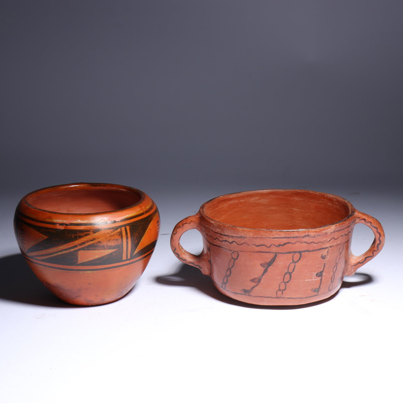 Pair of Native American Southwestern Hopi? pottery handle bowl and pot. 3"H x 6 1/2"W (largest): Pair of Native American Southwestern Hopi? pottery handle bowl and pot. 3"H x 6 1/2"W (largest)