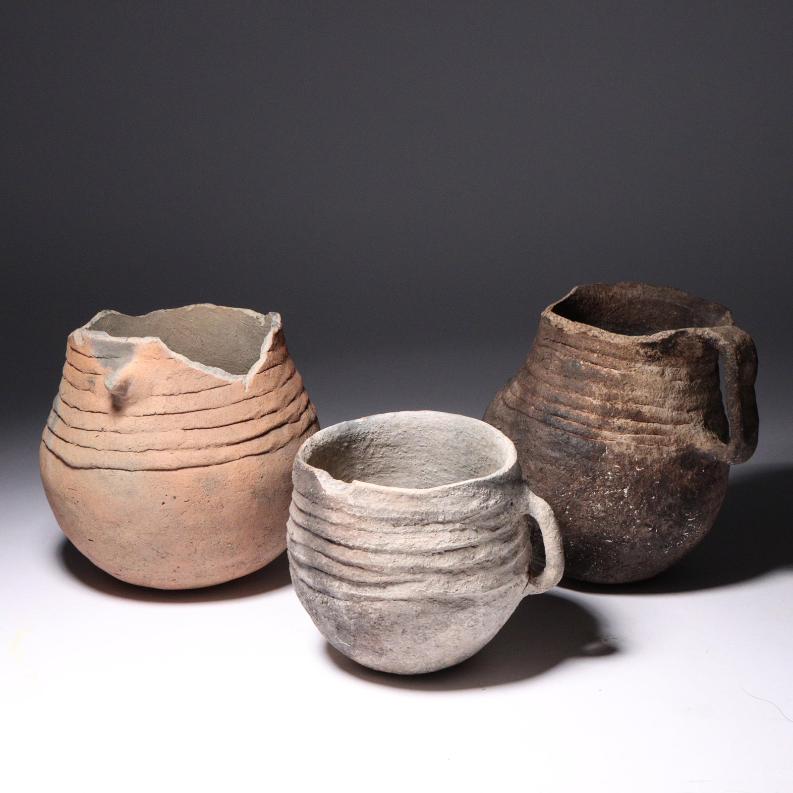 Three prehistoric Anasazi Mogollon Native American olla pottery vessels. 5 1/4"H x 5"W (largest) (1 of 6)