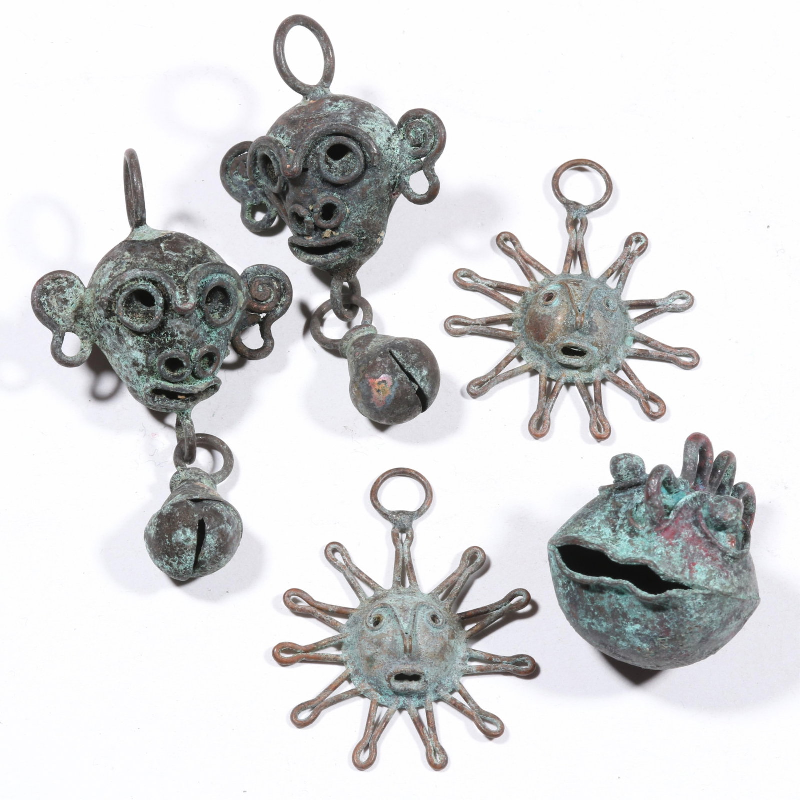 Mixtec Post-Conquest copper festival bells and pendants with monkeys, lizard, and pair of suns. 1 (1 of 10)