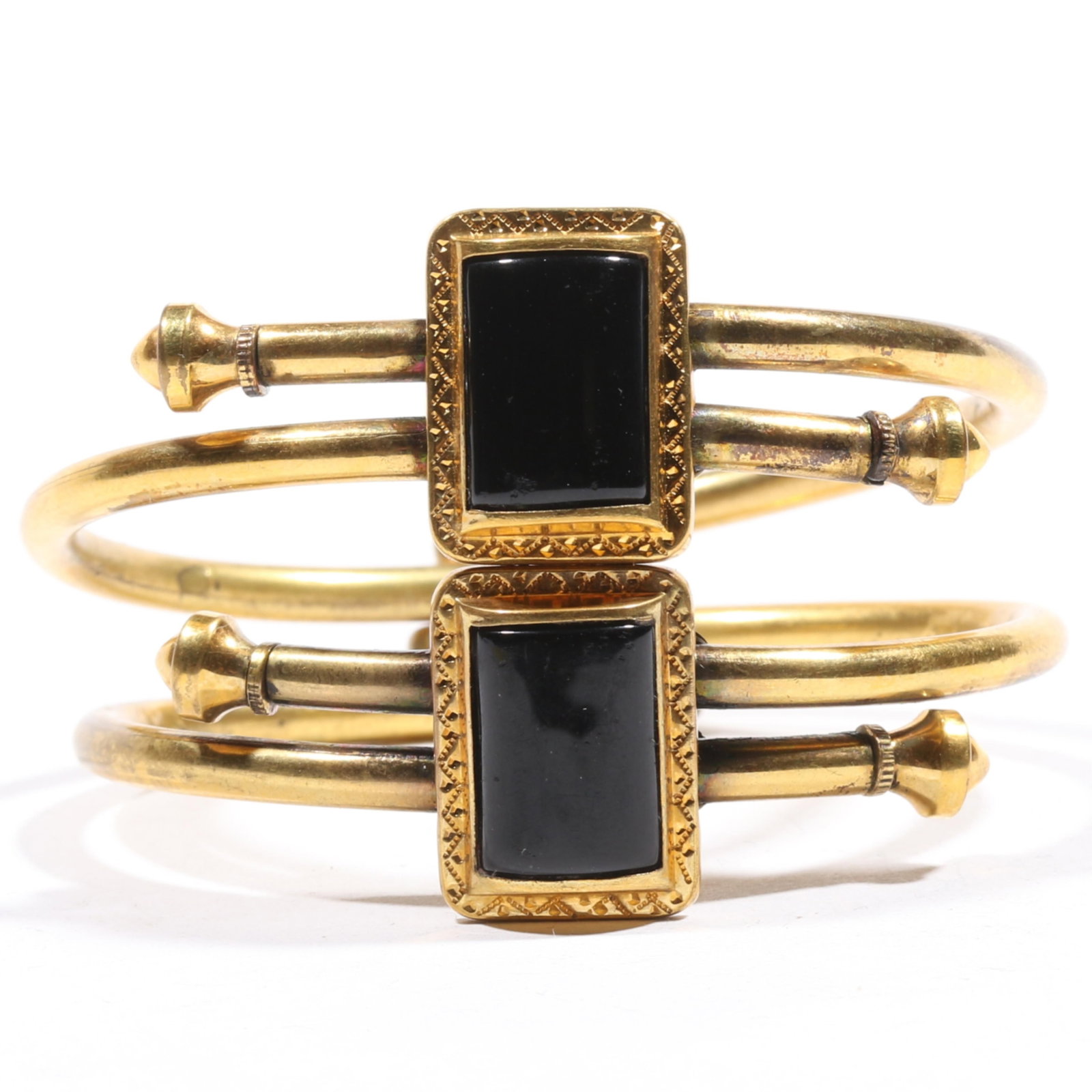 Antique Victorian matching onyx wedding bracelets. 7/8"H x 1 7/8"Inner Diameter (smaller bracelet): Antique Victorian matching onyx wedding bracelets. Patent dated 1879. 7/8"H x 1 7/8"Inner Diameter (smaller bracelet) Provenance: From the Estate of Susan Kellogg Flittner
