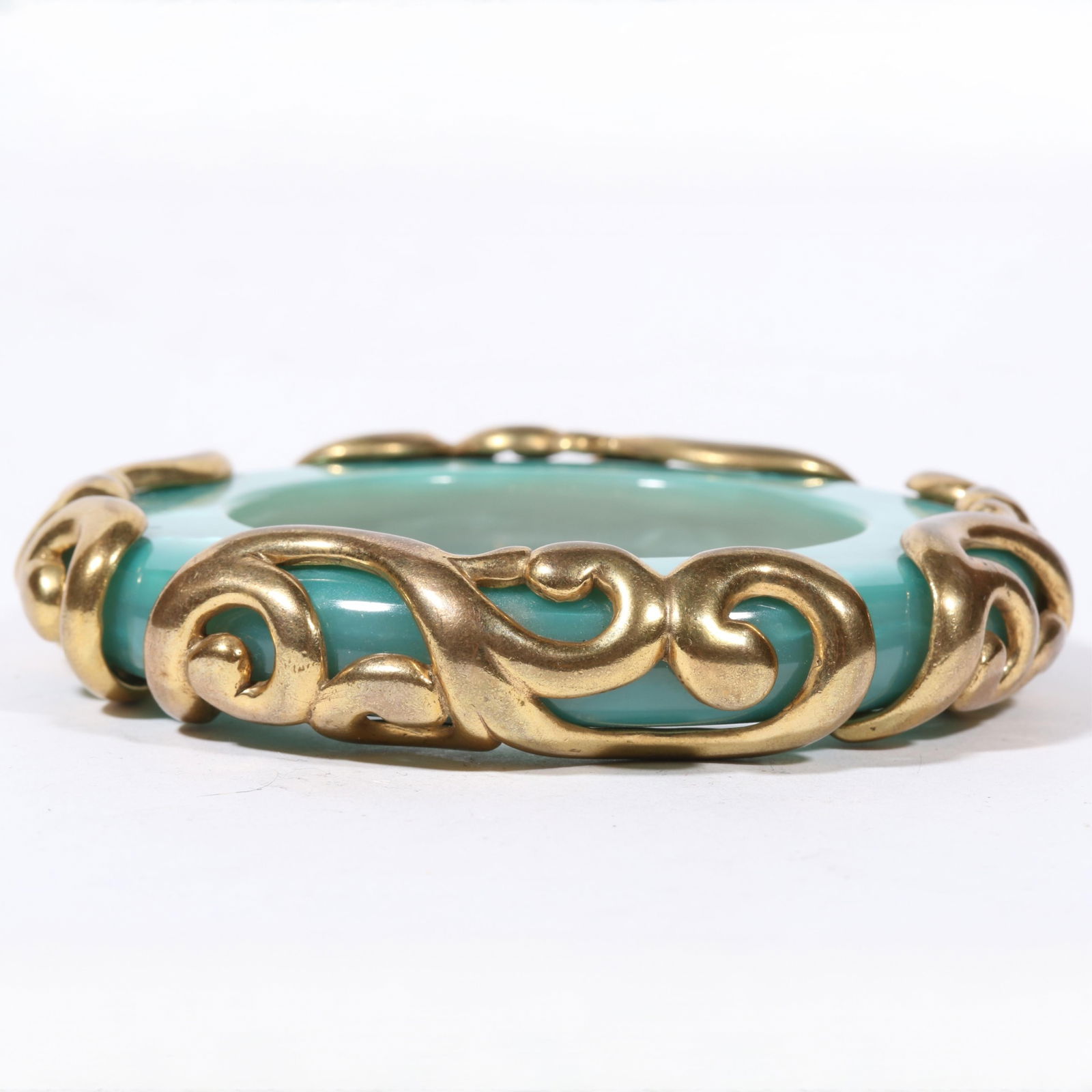 Isabel Canovas heavy pearlescent caribbean blue bangle bracelet with applied gilt brass swirl: Isabel Canovas heavy pearlescent caribbean blue bangle bracelet with applied gilt brass swirl patterns. 5/8"H x 2 3/8"Inner Diameter