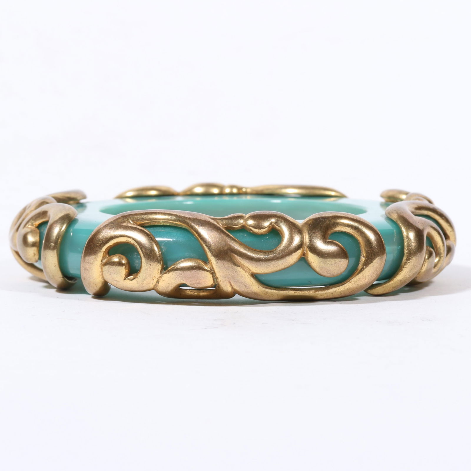 Isabel Canovas heavy pearlescent caribbean blue bangle bracelet with applied gilt brass swirl: Isabel Canovas heavy pearlescent caribbean blue bangle bracelet with applied gilt brass swirl patterns. 5/8"H x 2 3/8"Inner Diameter