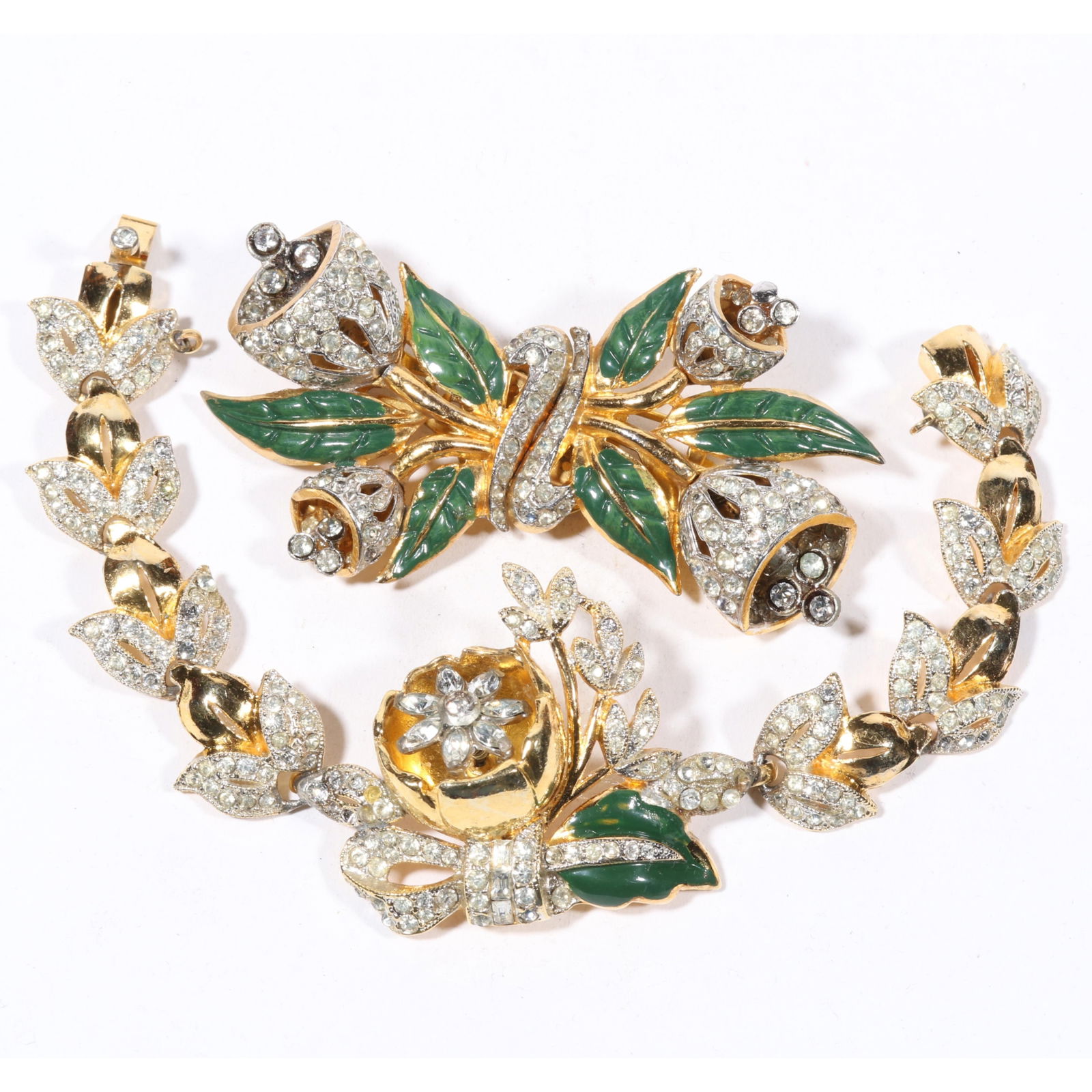 Vintage Art Deco Retro Coro Trembler demi parure with signed enamel Coro Duette trembler dress clip: Vintage Art Deco Retro Coro Trembler demi parure with signed enamel Coro Duette trembler dress clip brooch and matching unsigned enamel Coro trembler bracelet. Light wear to enamel, some "dead" stones