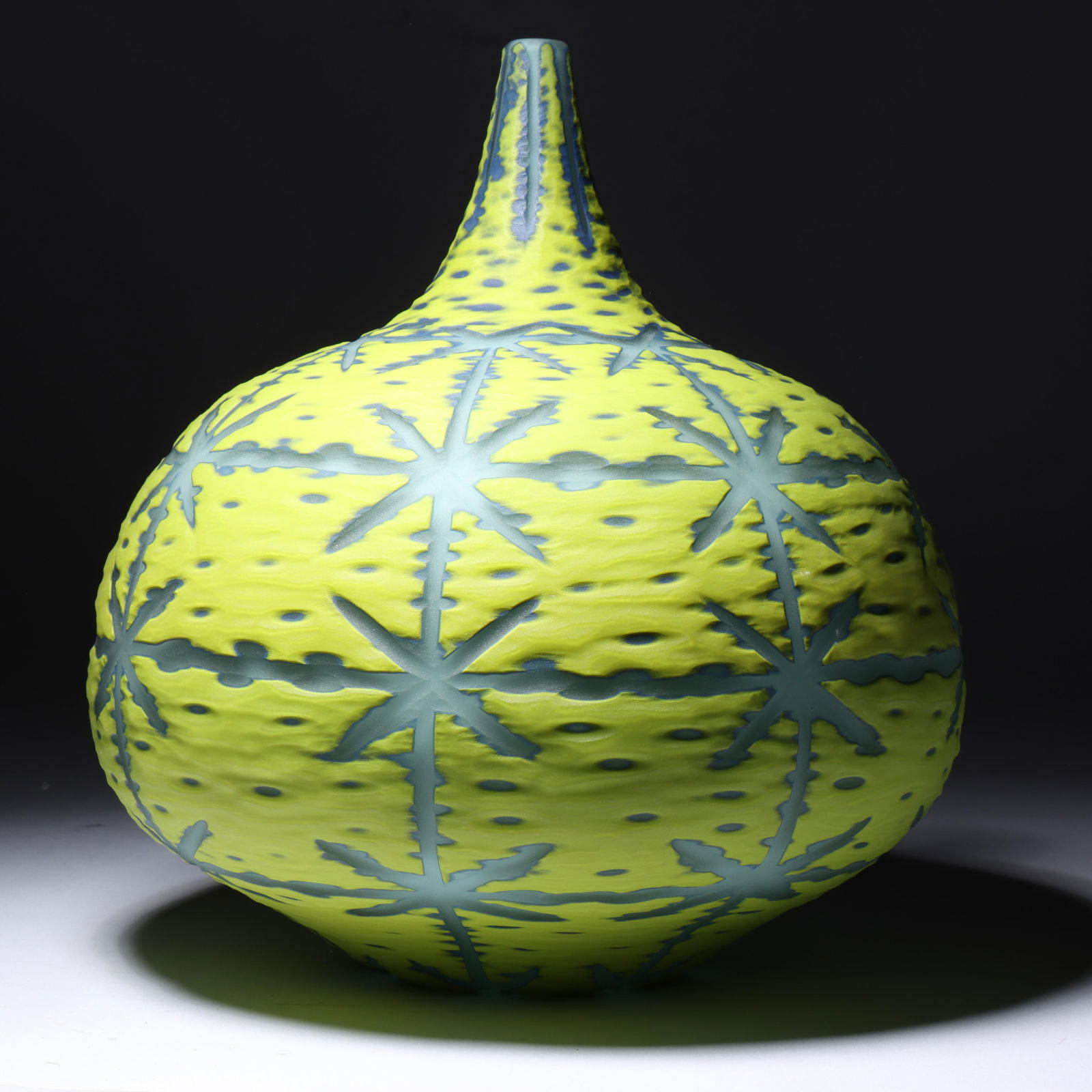 Ben Johnson, Indiana, Ohio (20th/21st century), Lines into Shapes II, "Twisted Blue Venetian": Ben Johnson Indiana, Ohio (20th/21st century) Lines into Shapes II, "Twisted Blue Venetian" etched carved art glass vessel Biography from BenjaminJohnsonGlass.com: Born in Cicero, Indiana, Benjamin Jo