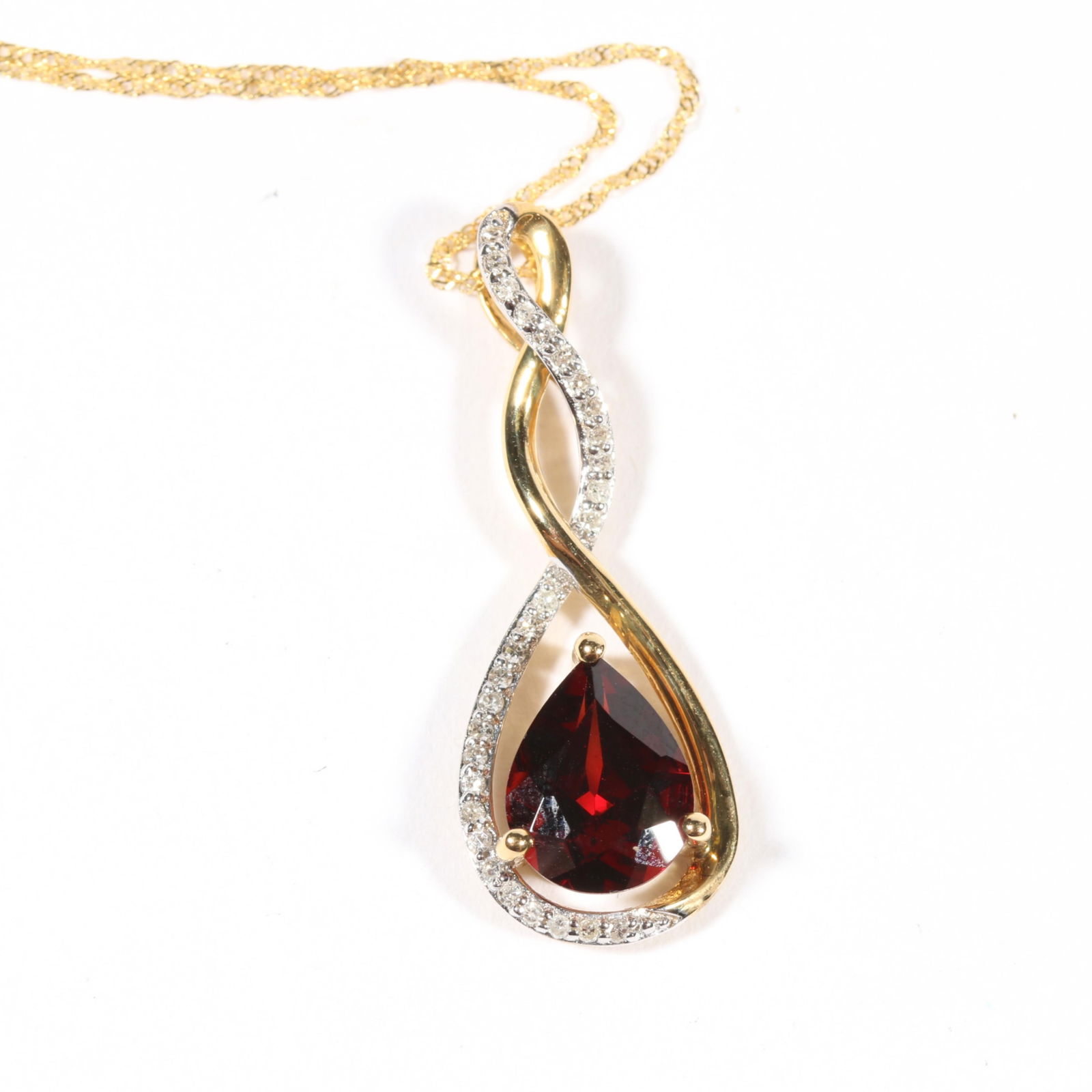 14K yellow gold garnet and diamond pendant on 14K gold chain. 17 3/4"L x 1 1/8"Drop (1 of 12)