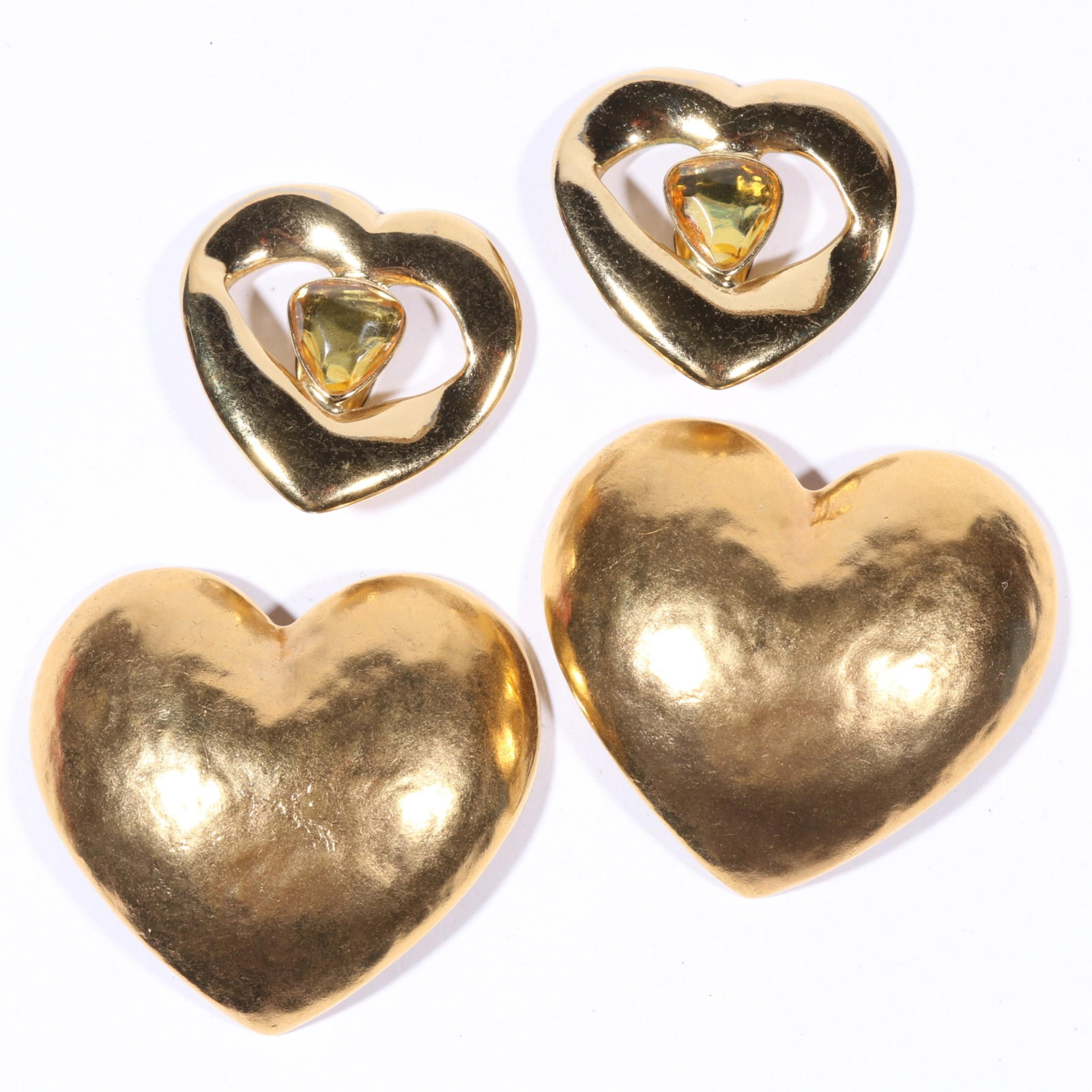 YSL Yves Saint Laurent two pairs of gilt heart earrings. 2"H x 2 3/8"W (largest): YSL Yves Saint Laurent two pairs of gilt heart earrings. 2"H x 2 3/8"W (largest)