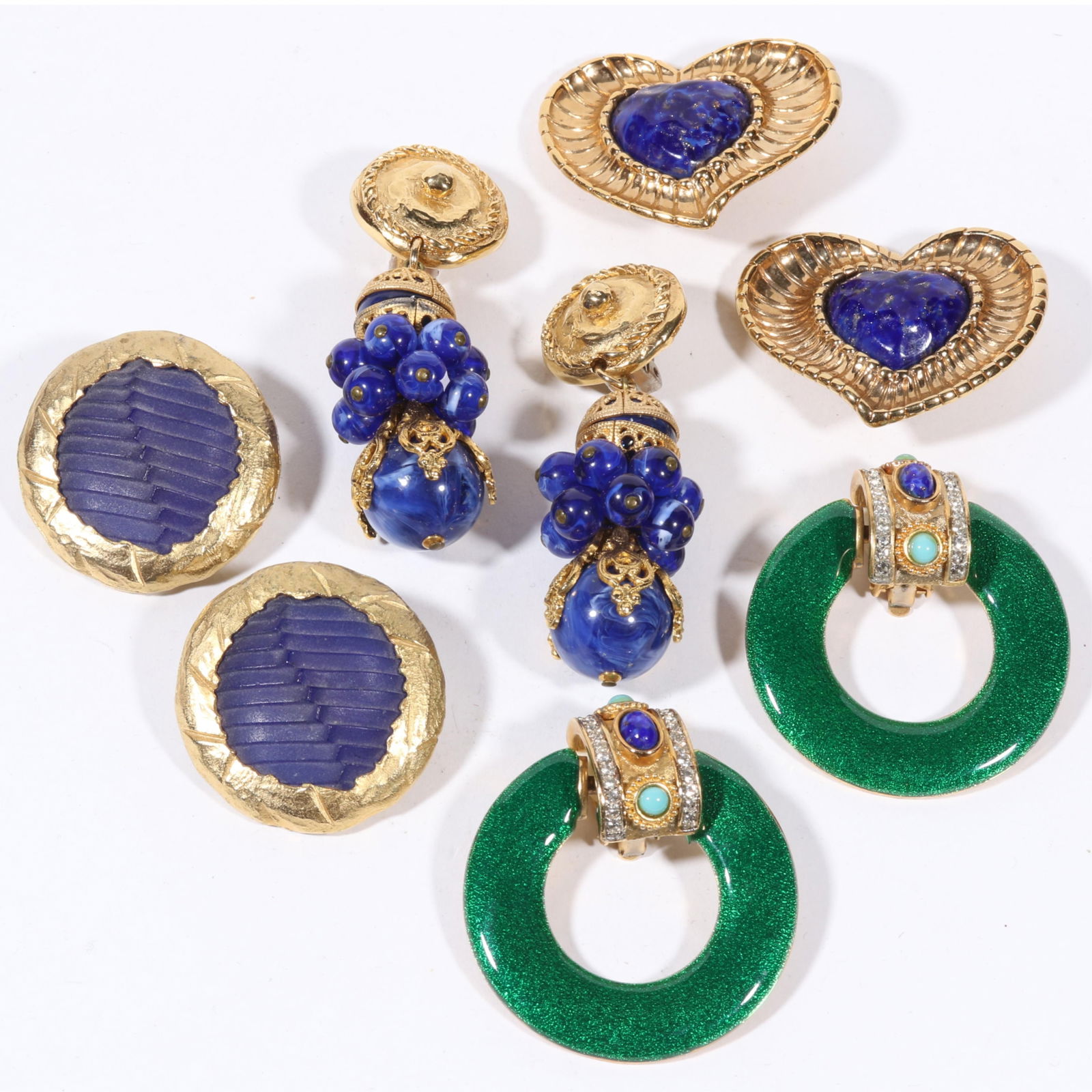 Large designer earrings 4pc. group with Guy Laroche Paris art glass heart earrings, Claude Montana: Large designer earrings 4pc. group with Guy Laroche Paris art glass heart earrings, Claude Montana blue glass earrings, Craft enamel and jeweled earrings, and plastic blue swirl beaded drop earrings.
