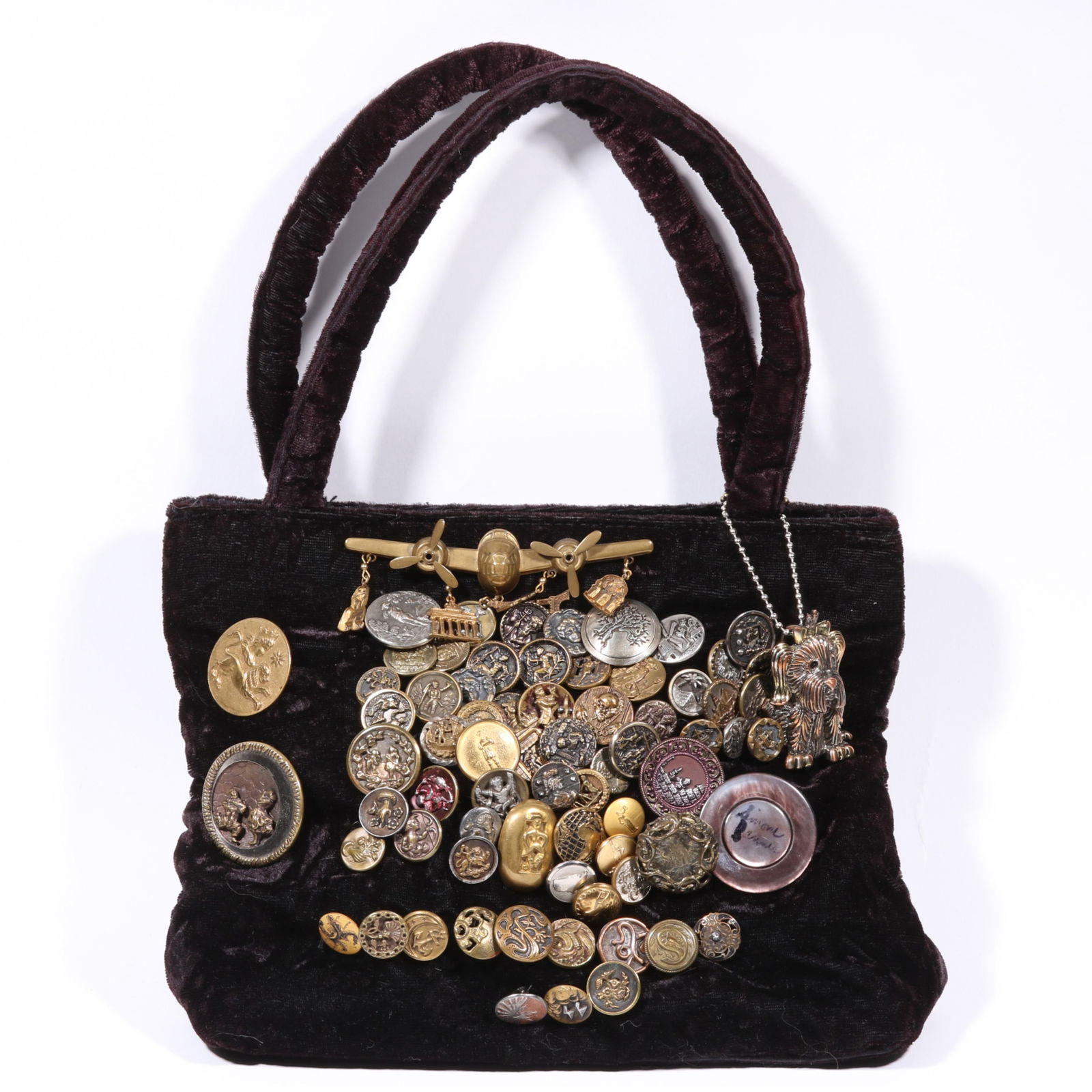 Simone Brenner artisan button bag including birds and flowers, animal buttons on one side, people,: Simone Brenner artisan button bag including birds and flowers, animal buttons on one side, people, places, and design buttons on the other side. 6 large buttons and an airplane pin with famous destina