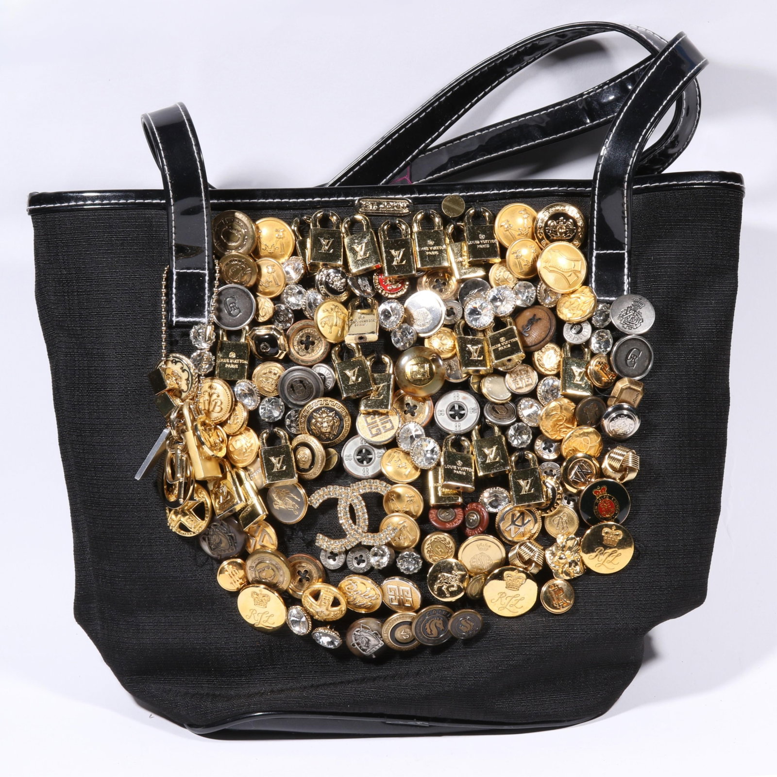 Simone Brenner artisan designer button bag including Chanel, Yves Saint Laurent, Valentino,: Simone Brenner artisan designer button bag including Chanel, Yves Saint Laurent, Valentino, Givenchy, Burberry, Ralph Lauren, Escada, St. John, and more. 125 designer buttons total. Bag is Estee Laude