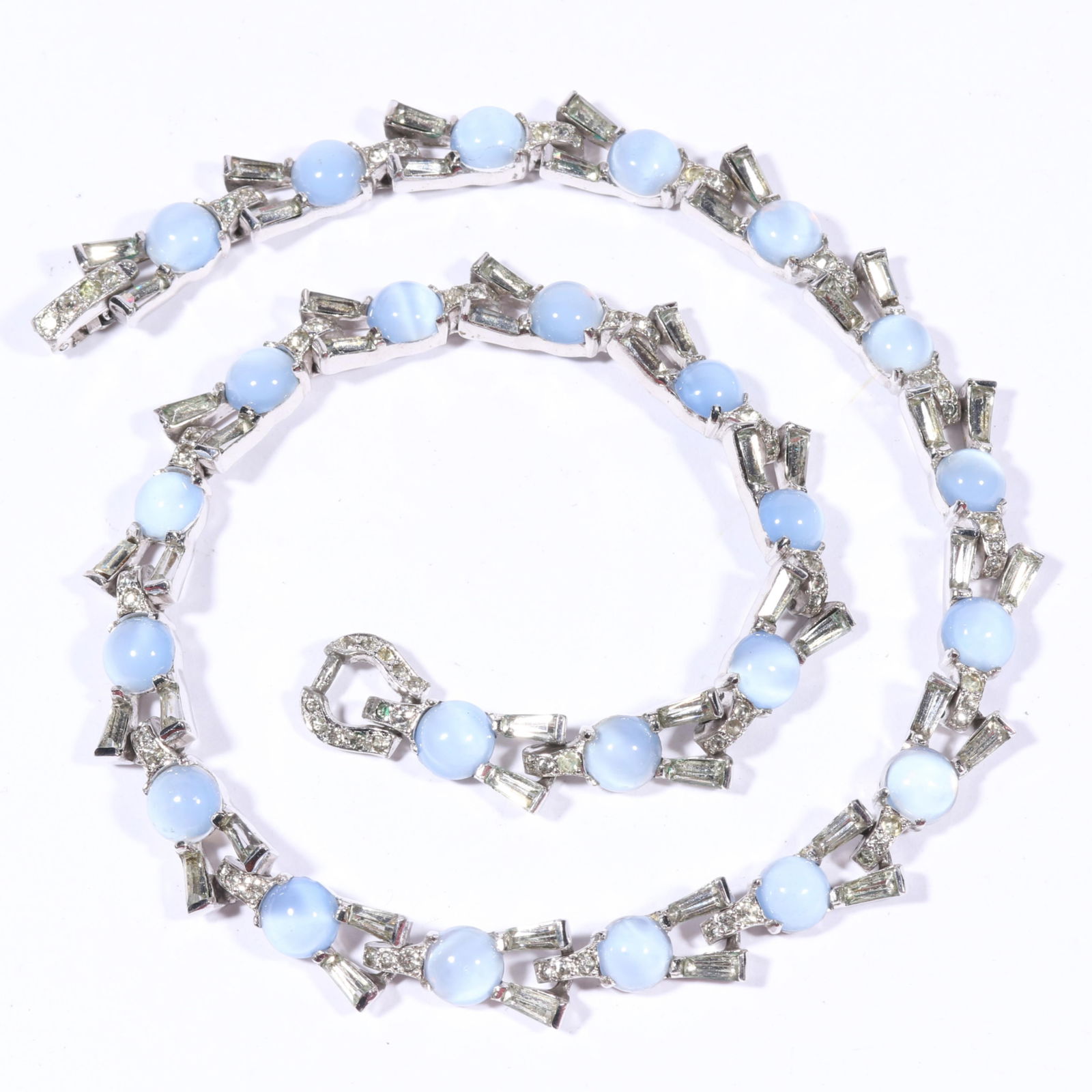 Mazer / Mazer Bros Retro Art Deco dainty blue moonglow cabochon necklace with rhinestone crystal: Mazer / Mazer Bros Retro Art Deco dainty blue moonglow cabochon necklace with rhinestone crystal accents. One missing rhinestone and replaced rhinestone. Provenance: From the collection of Cheryl Kill