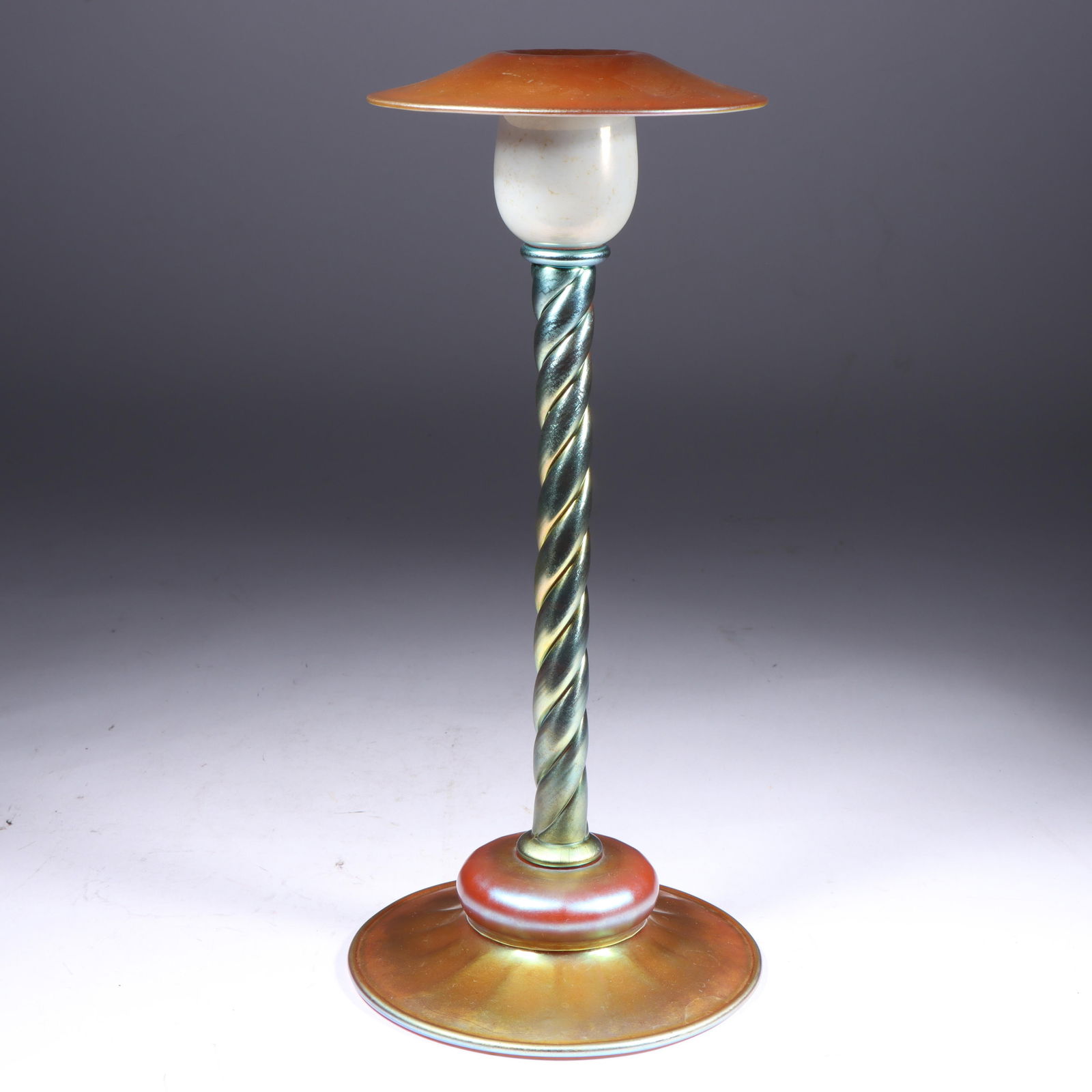 Steuben gold Aurene floriform art glass vase with twist stem. 11 1/4"H x 5 1/2"Diam.: Steuben gold Aurene floriform art glass vase with twist stem. 11 1/4"H x 5 1/2"Diam.