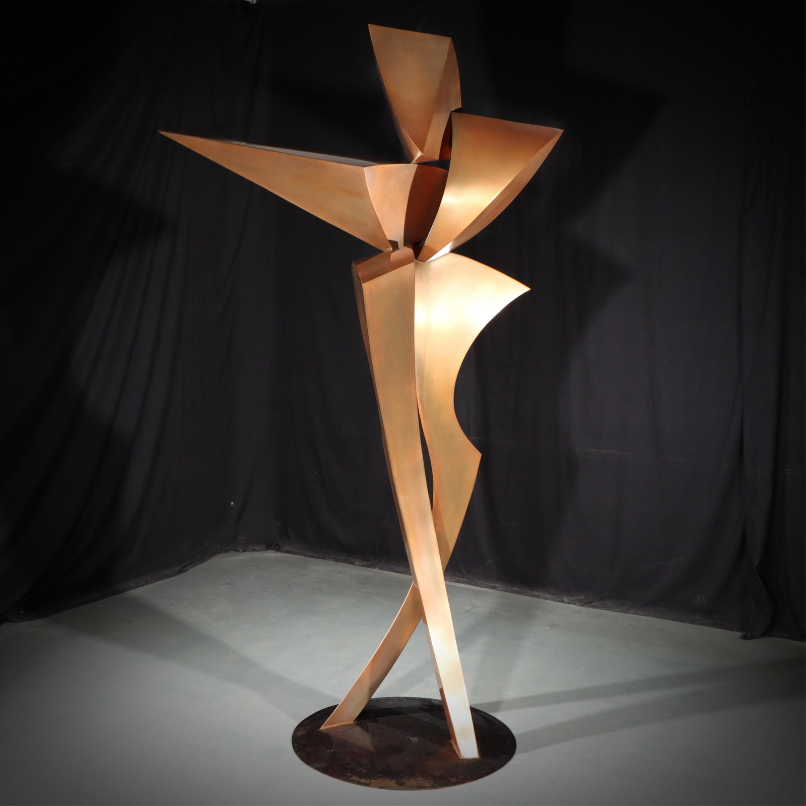 Lyle London, American (20th/21st Century), Oracle, 1992, brushed bronze, 87"H x 50"W: LyleLondonAmerican(20th/21st Century)Oracle, 1992brushed bronzesigned and dated to top of base. ARTIST BIOLyle London grew up in a military family that was regularly relocated and attended a total of 