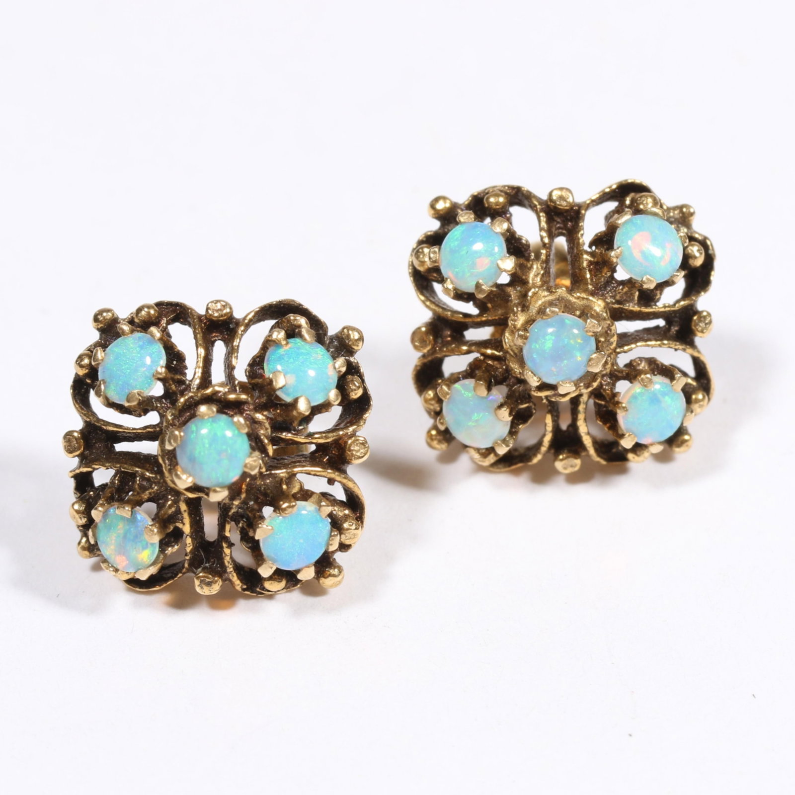 Unmarked tested 14K yellow gold earrings with opal accents. 1/2" x 1/2": Unmarked tested 14K yellow gold earrings with opal accents.3.2DWT total One earring back marked 14K and other earring back is NOT gold. From the Collection of Connie DeNave "JewelDiva" The purchase of