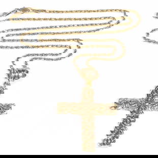 14K yellow and white gold cross pendant on 14K yellow gold chain. 15 1/8"L x 1 5/8"Drop: 14K yellow and white gold cross pendant on 14K yellow gold chain.3.3DWT total The purchase of gold requires confirmed funds.15 1/8"L x 1 5/8"Drop