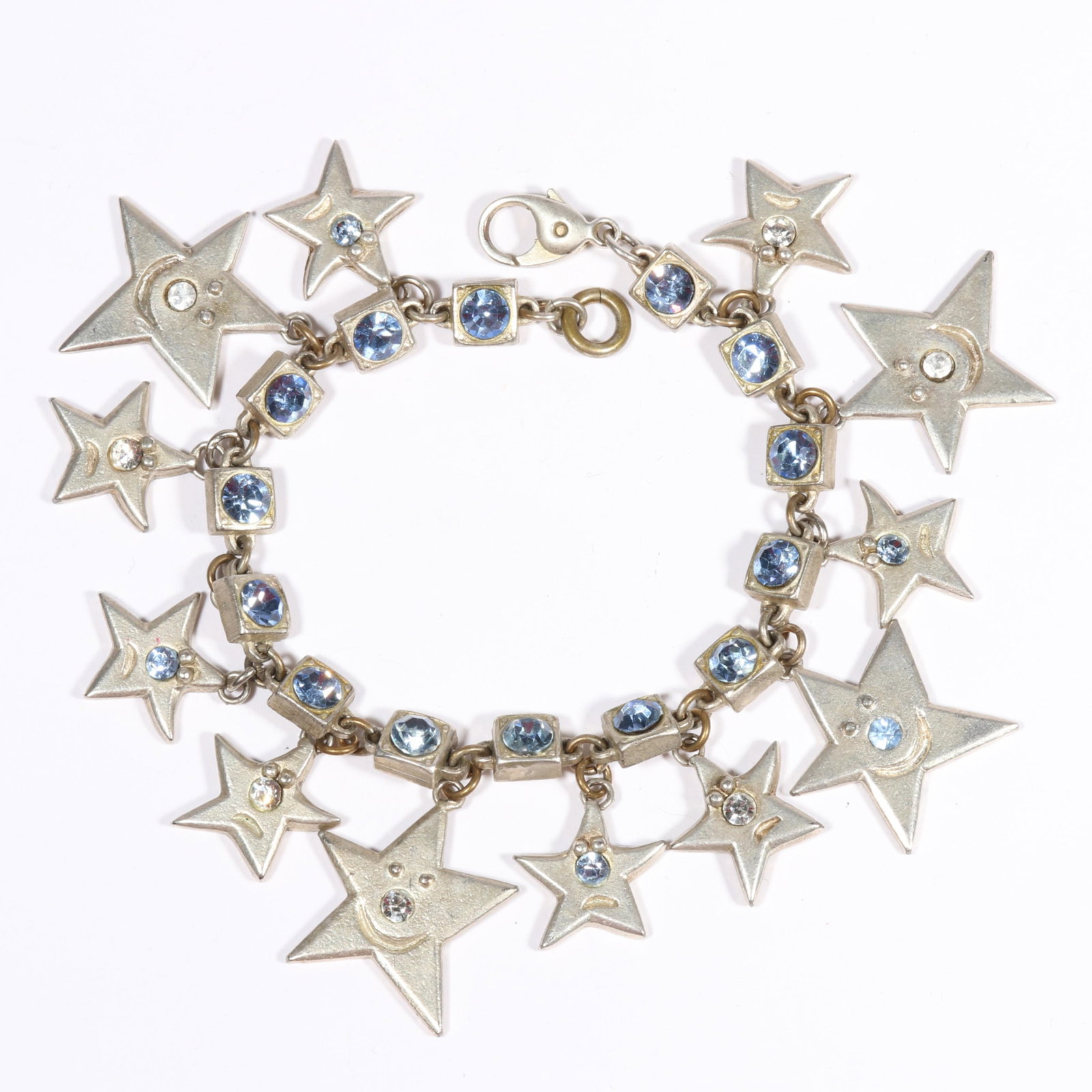 Billy Boy Paris Surreal Bijoux designer personified star charm bracelet with sky blue crystals. 8"L: Billy Boy Paris Surreal Bijoux designer personified star charm bracelet with sky blue crystals.One missing charm.8"L x 1 1/4"Drop