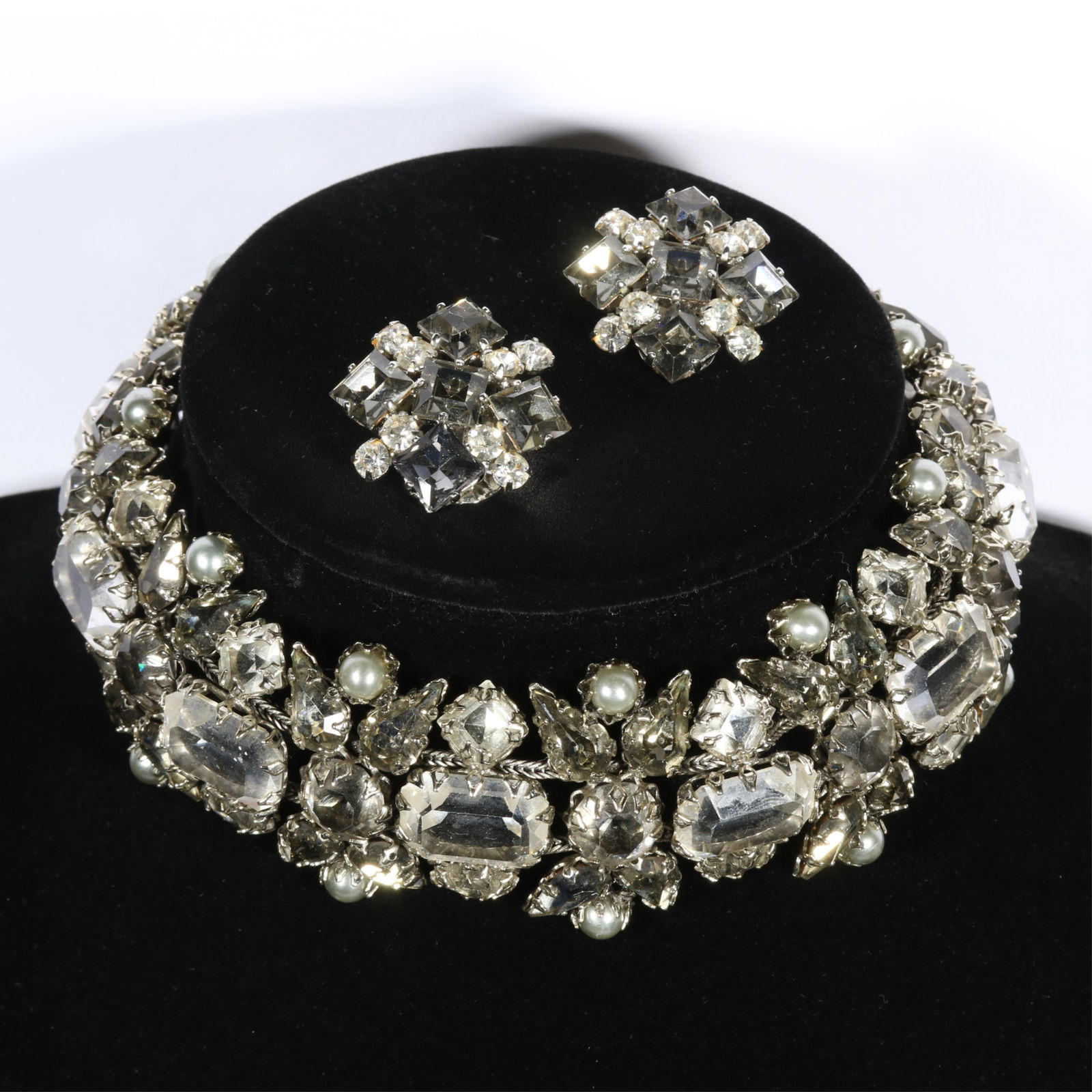 Schreiner grey scale rhinestone crystal and faux pearl accented demi parure: choker necklace and: Schreiner grey scale rhinestone crystal and faux pearl accented demi parure: choker necklace and earrings.Necklace unsigned, earrings are signed.15 3/8"L x 1 3/8"W (necklace)