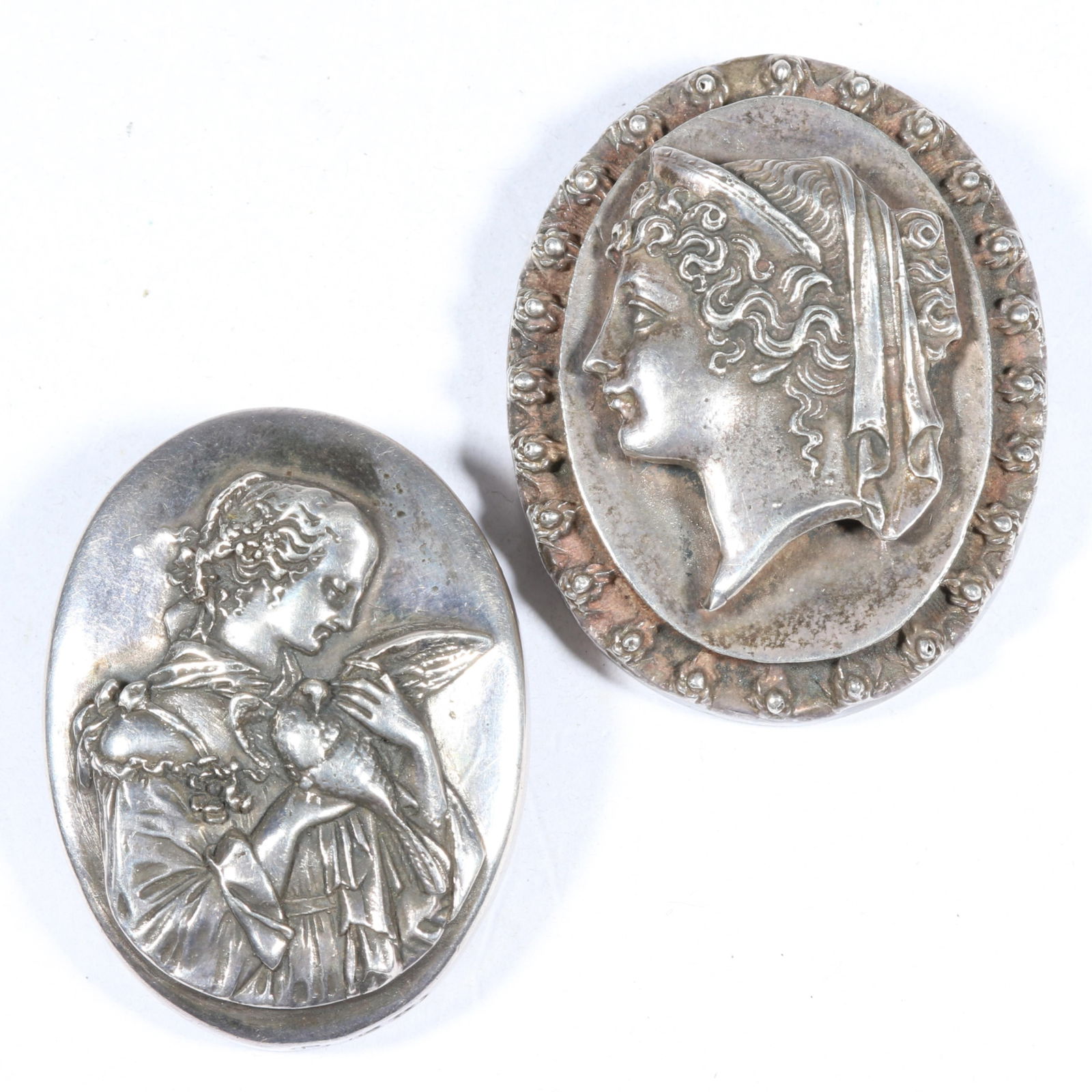Pair of Henryk Winograd 999 and sterling silver repousse cameo pendant brooches. 2"H x 1 5/8"W (1 of 7)