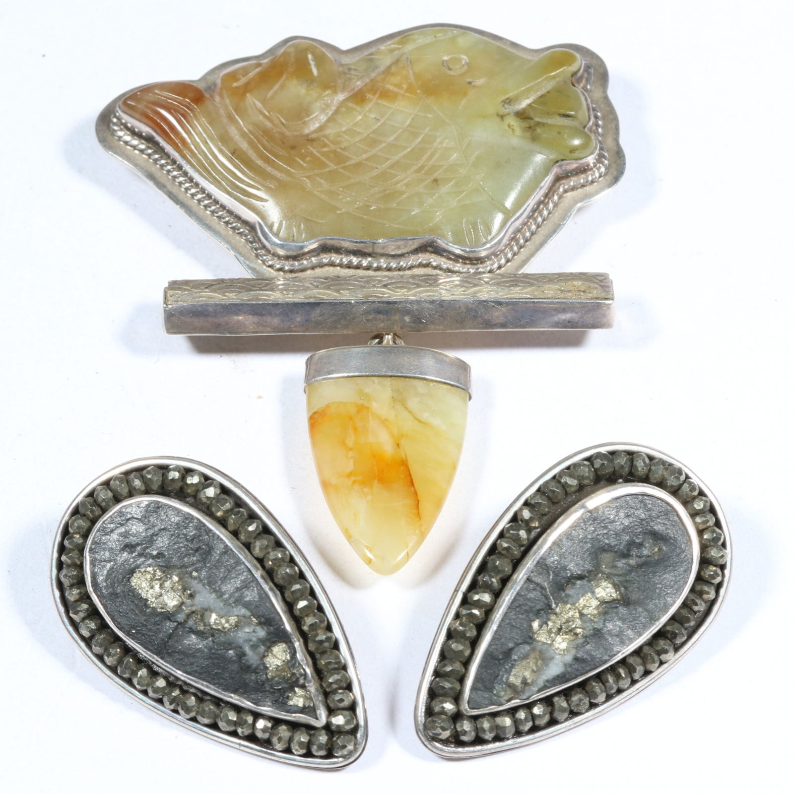 Jewelry group by Amy Kahn Russell, featuring a sterling silver pendant brooch with an antique carved (1 of 8)