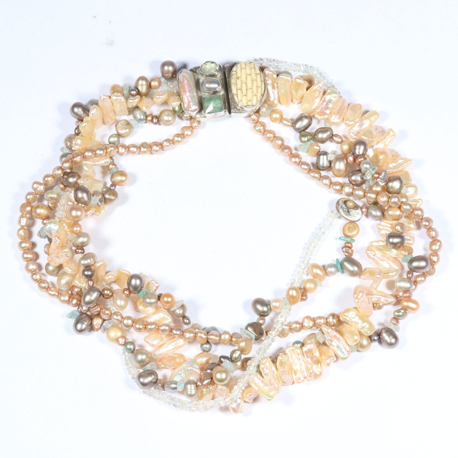 Amy Kahn Russell multi-strand pearl necklace featuring a variety of pearls, aquamarine, white topaz,: Amy Kahn Russell multi-strand pearl necklace featuring a variety of pearls, aquamarine, white topaz, and carved bone, with an ornate clasp. 16 1/2"L x 1 5/8"W