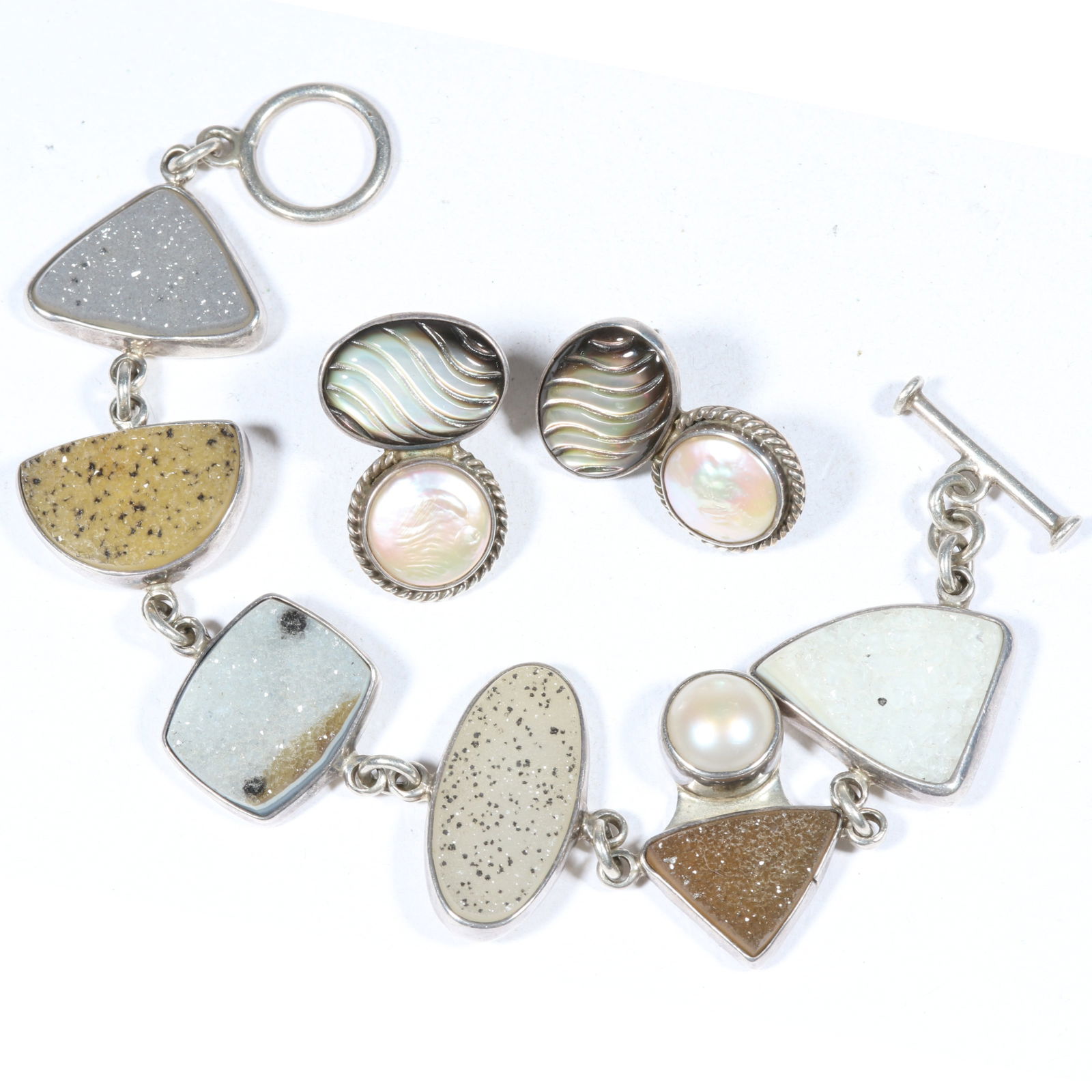 Echo of the Dreamer jewelry group including druzy stone and cultured pearl bracelet with carved MOP (1 of 8)