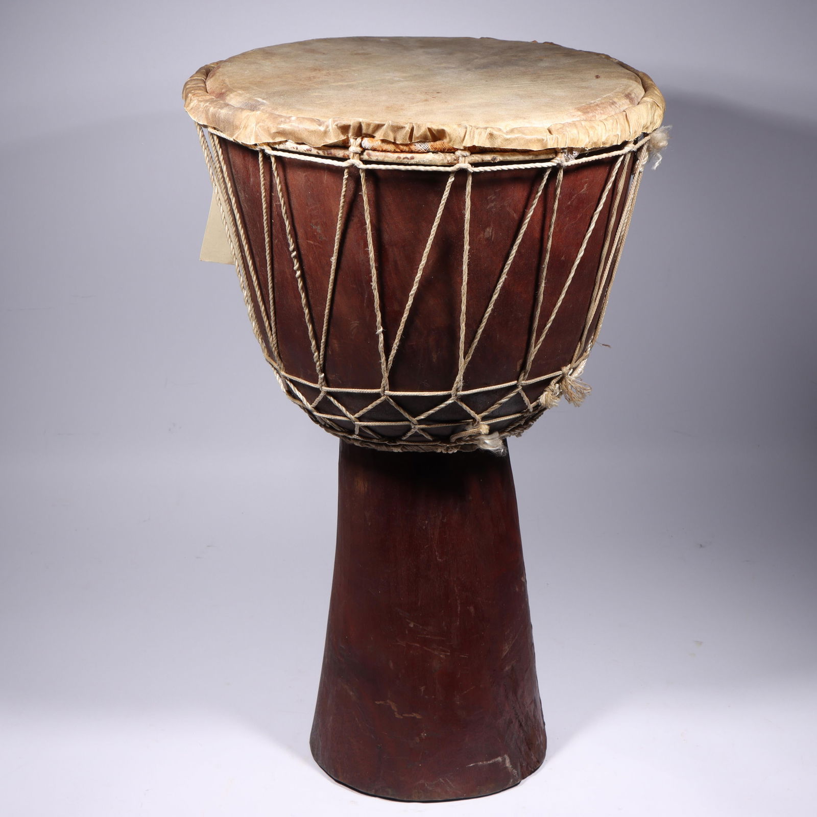 African tribal Djembe drum with hide cover and webbed rope 24'H x 15 1/2'Diam. (1 of 9)