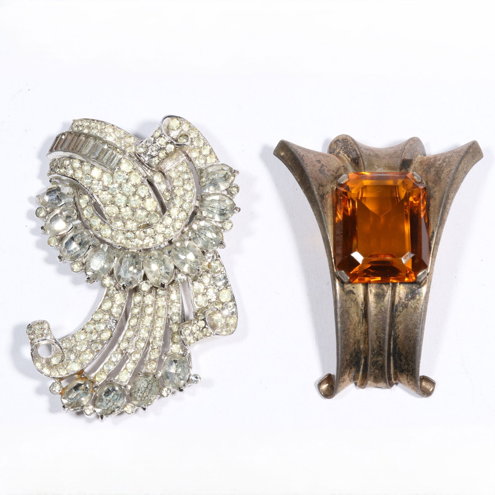 Crown Trifari retro sterling vermeil large citrine jewel fur clip with Coro Craft diamante fur clip.: Crown Trifari retro sterling vermeil large citrine jewel fur clip with Coro Craft diamante fur clip. 2 5/8"H x 2 7/8"W (coro fur clip)Provenance: Inga Levin at Queensantiques LL collection