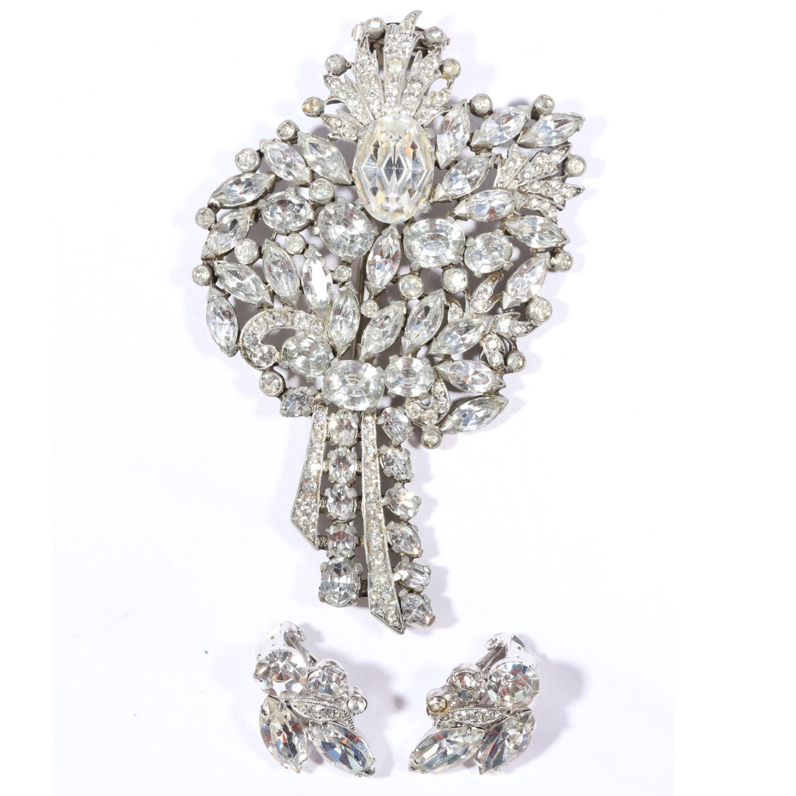 Eisenberg Original heavy diamante jeweled floral fur clip with Eisenberg earrings 4'H x 2 5/8'W: Eisenberg Original heavy diamante jeweled floral fur clip with Eisenberg earrings 4"H x 2 5/8"WProvenance: Inga Levin at Queensantiques LL collection