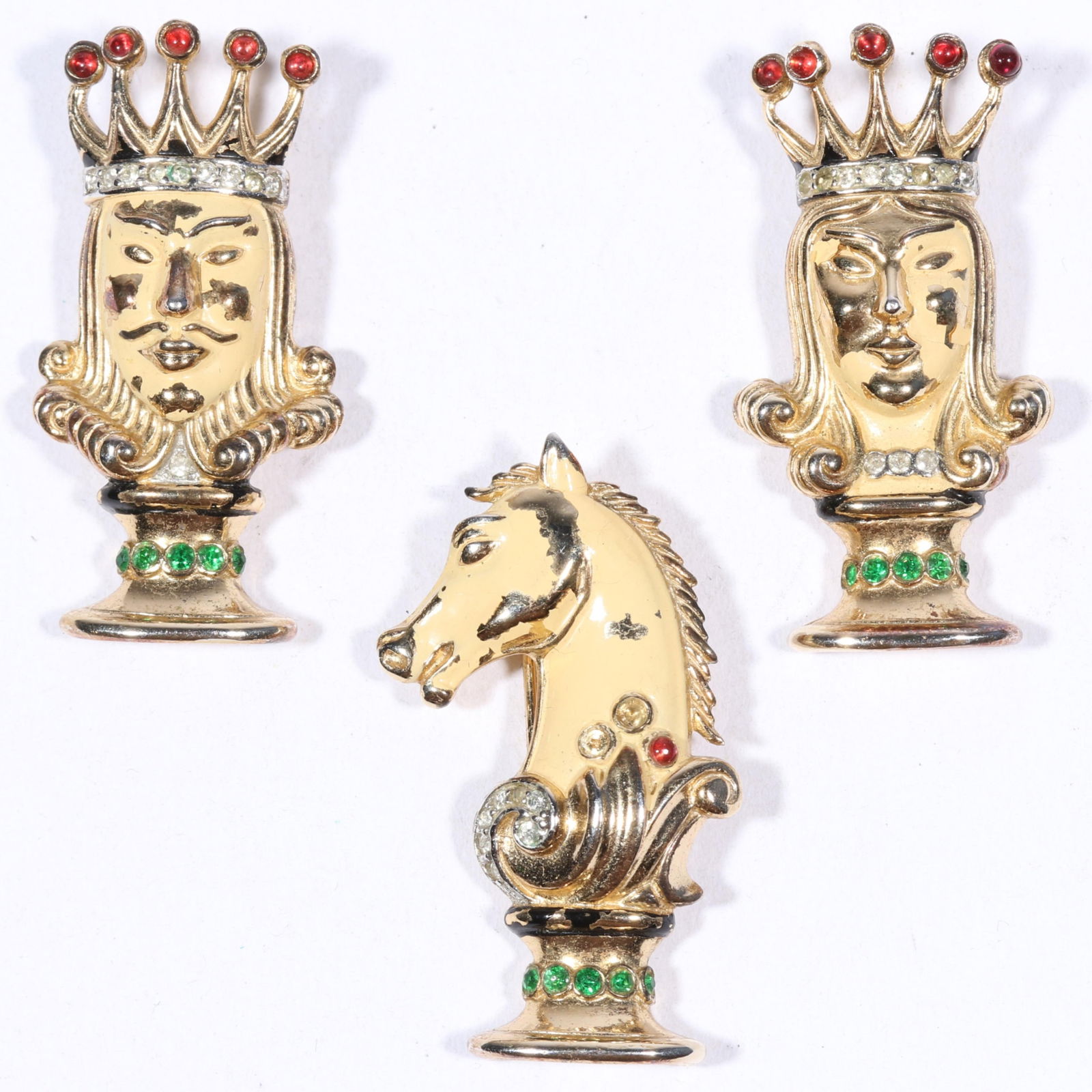 Trifari ''Alfred Philippe'' 1945 sterling vermeil figural 'Chess Men'' book piece fur clip set;: Trifari ''Alfred Philippe'' 1945 sterling vermeil figural "Chess Men'' book piece fur clip set; enamel and rhinestone King, Queen, and Knight. Book Reference: American Costume jewelry Vol. 2 by Carla